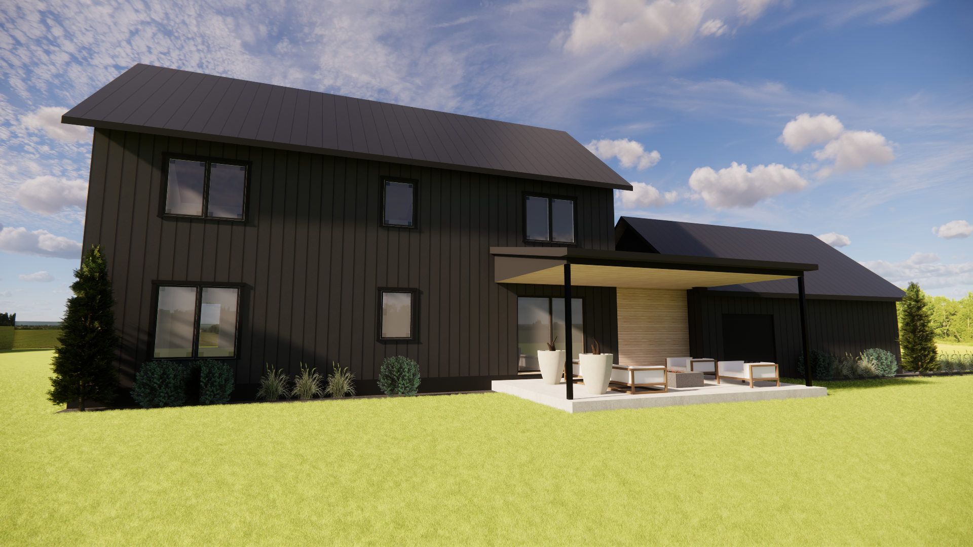 Modern two-story black house with a covered patio, outdoor seating, and potted plants, set on a grassy lawn under a blue sky with scattered clouds.