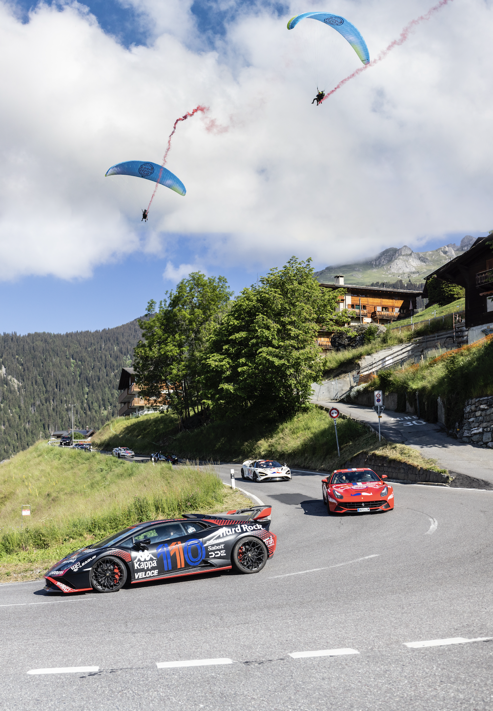 Car departures from Verbier in tandem with branded paragliders