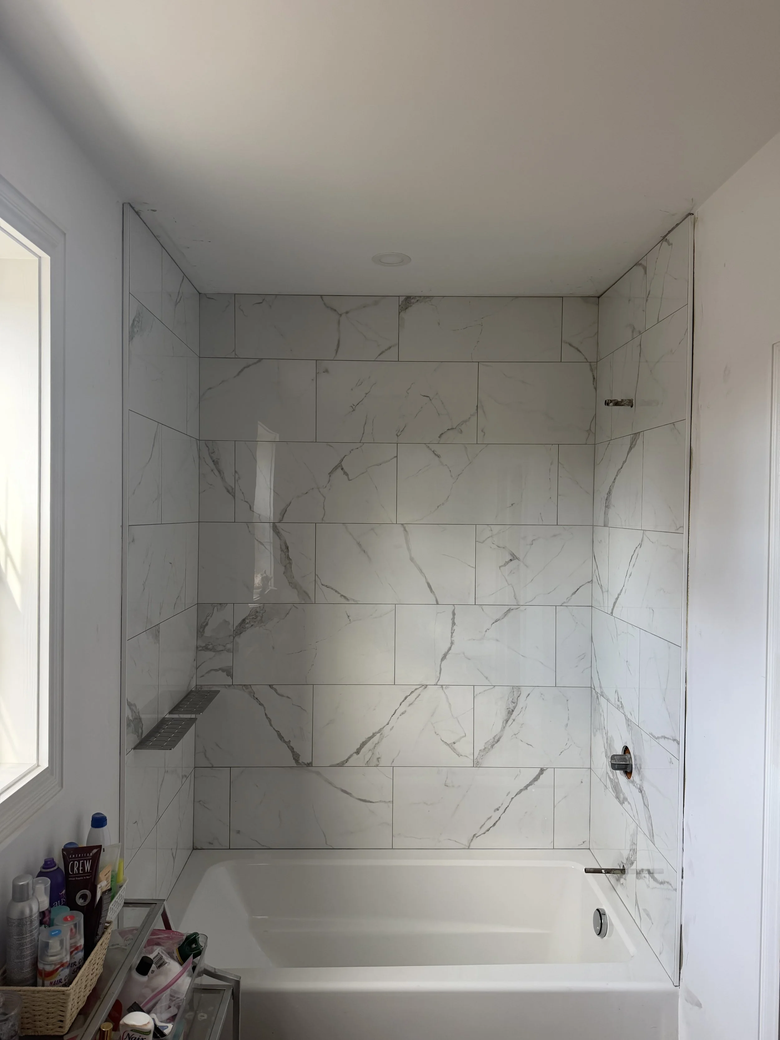 Premium bathroom tile contractor delivering custom shower tile, luxury flooring, and detailed craftsmanship for refined spaces.