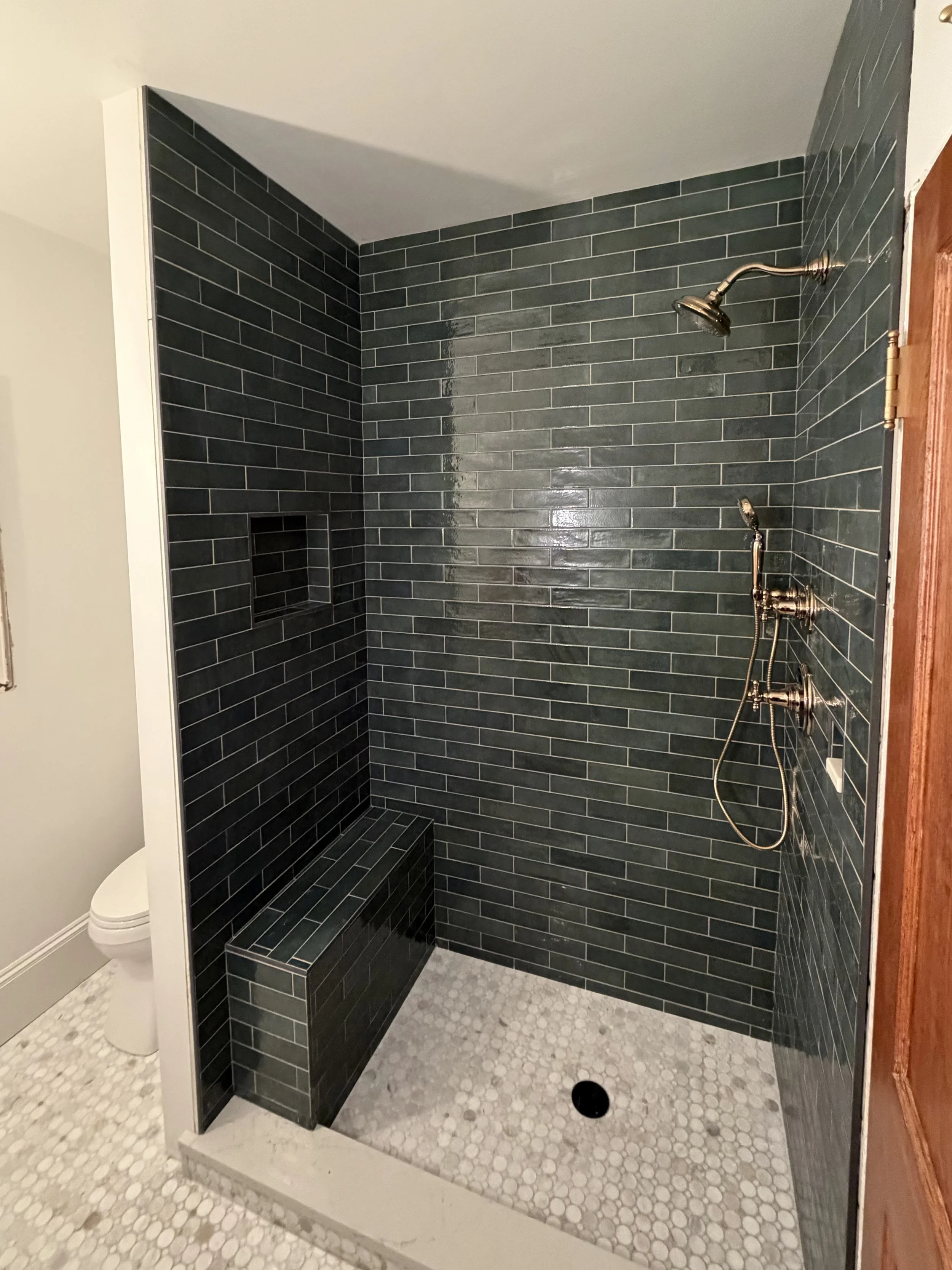 Modern bathroom tile installation with clean lines, moisture-resistant materials, and professional finishes built to last.