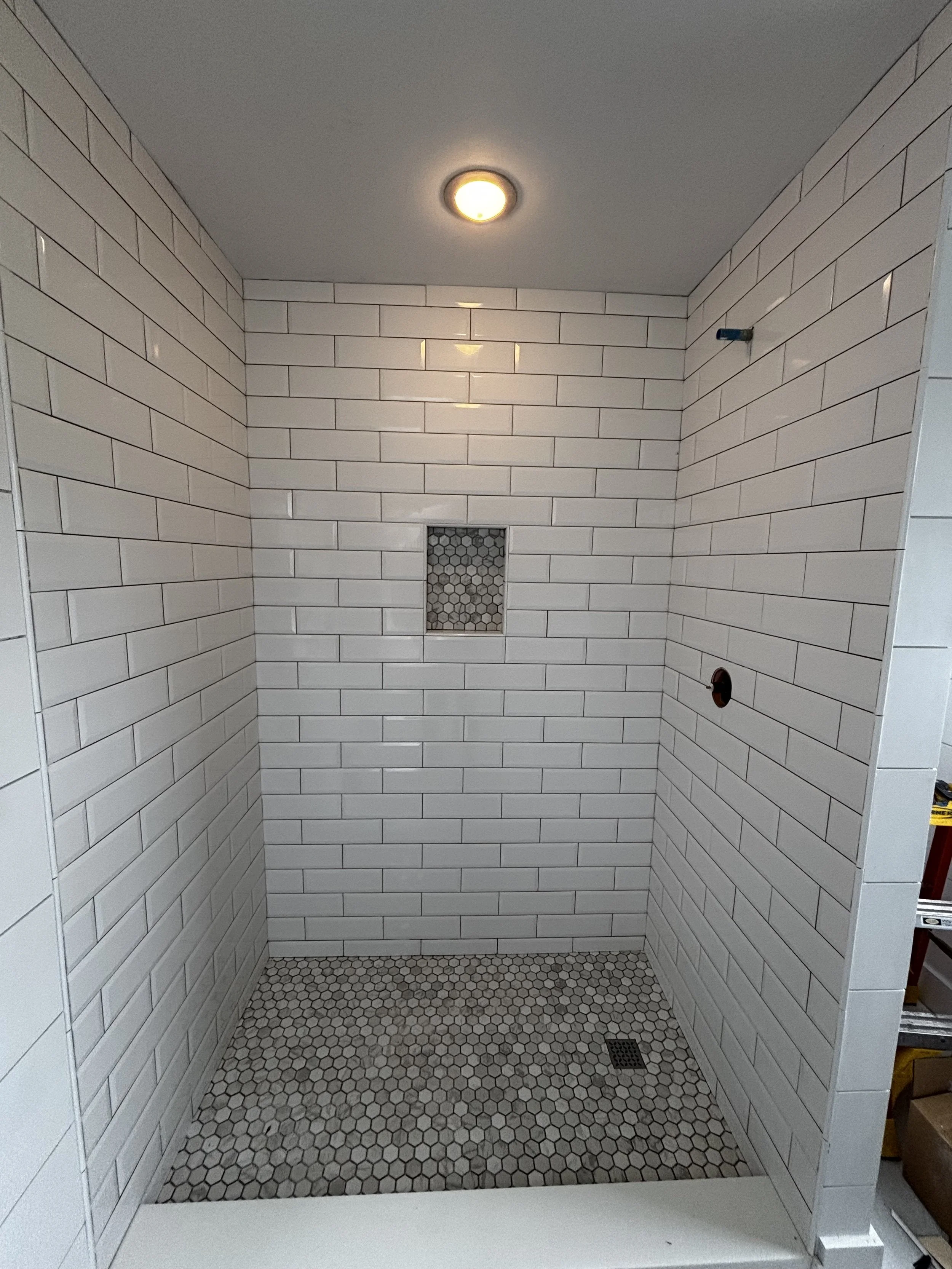 Looking for trusted bathroom tile installation? We provide precision tile work, premium materials, and beautiful results. Contact us today for a free estimate.