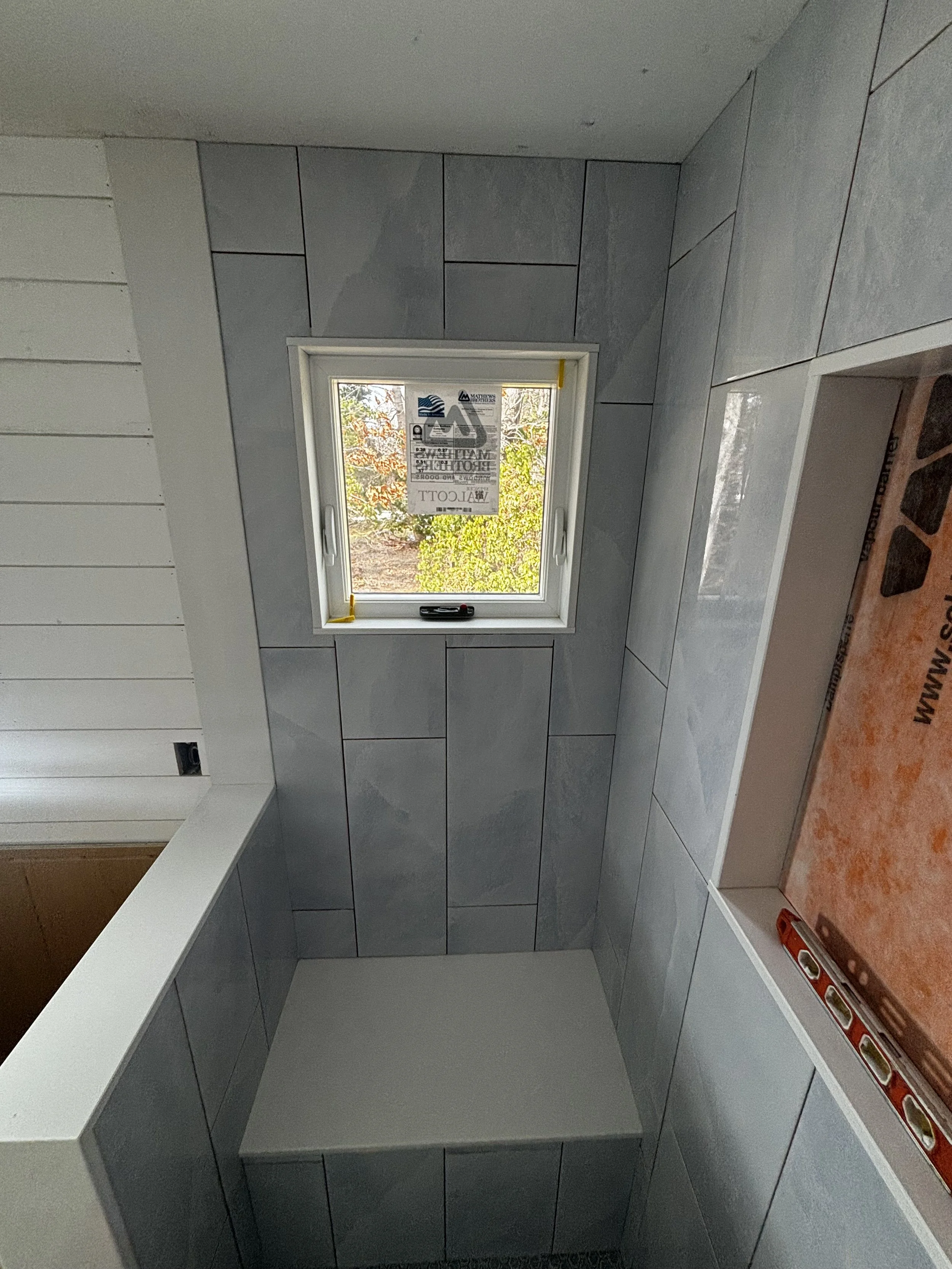Our bathroom tile installation service in MA includes custom shower walls, floor tile, and detailed finishes designed for moisture protection and long-term performance.
