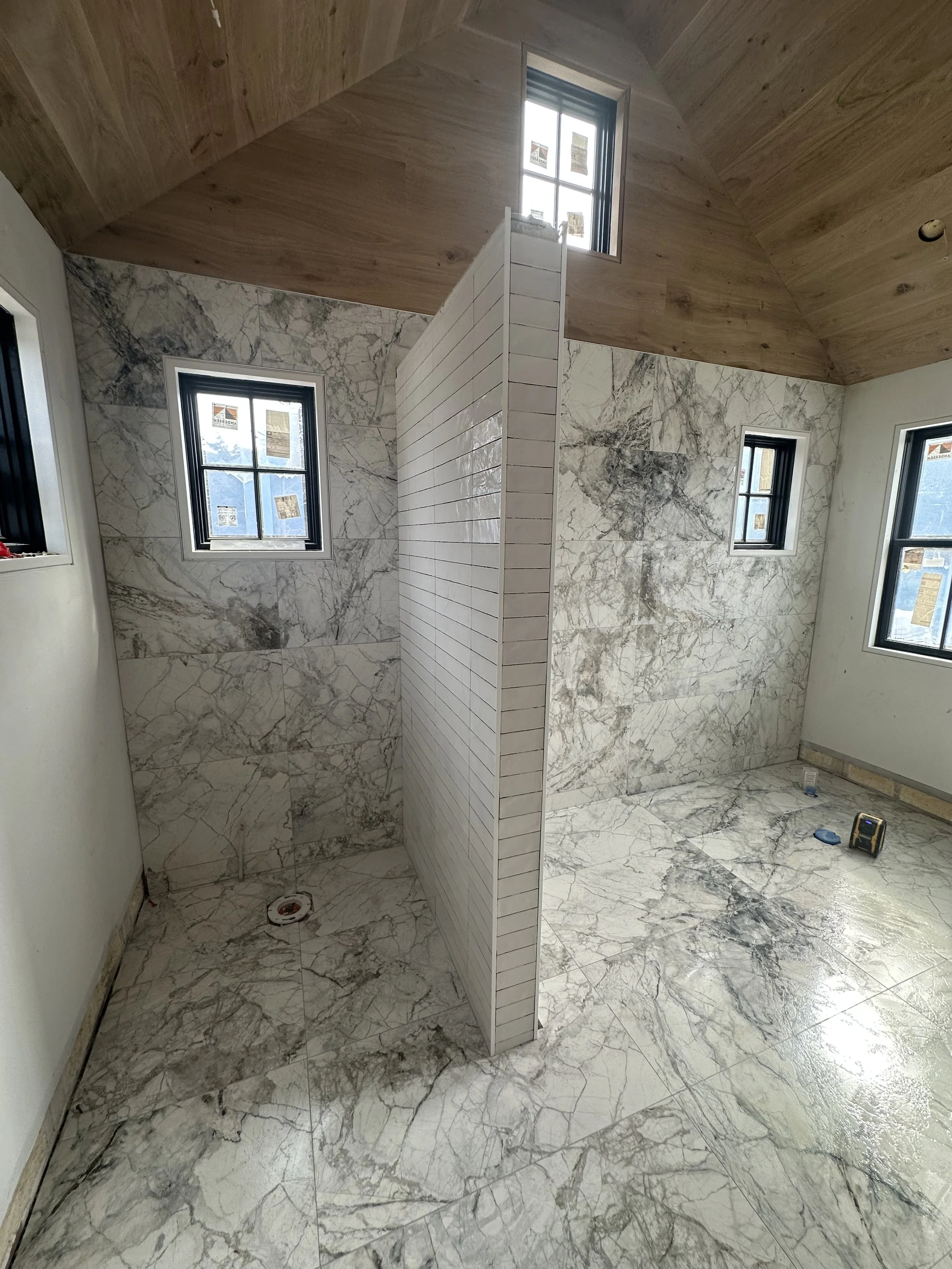 Expert bathroom tile installation for showers and floors using quality materials, clean lines, and flawless finishes.