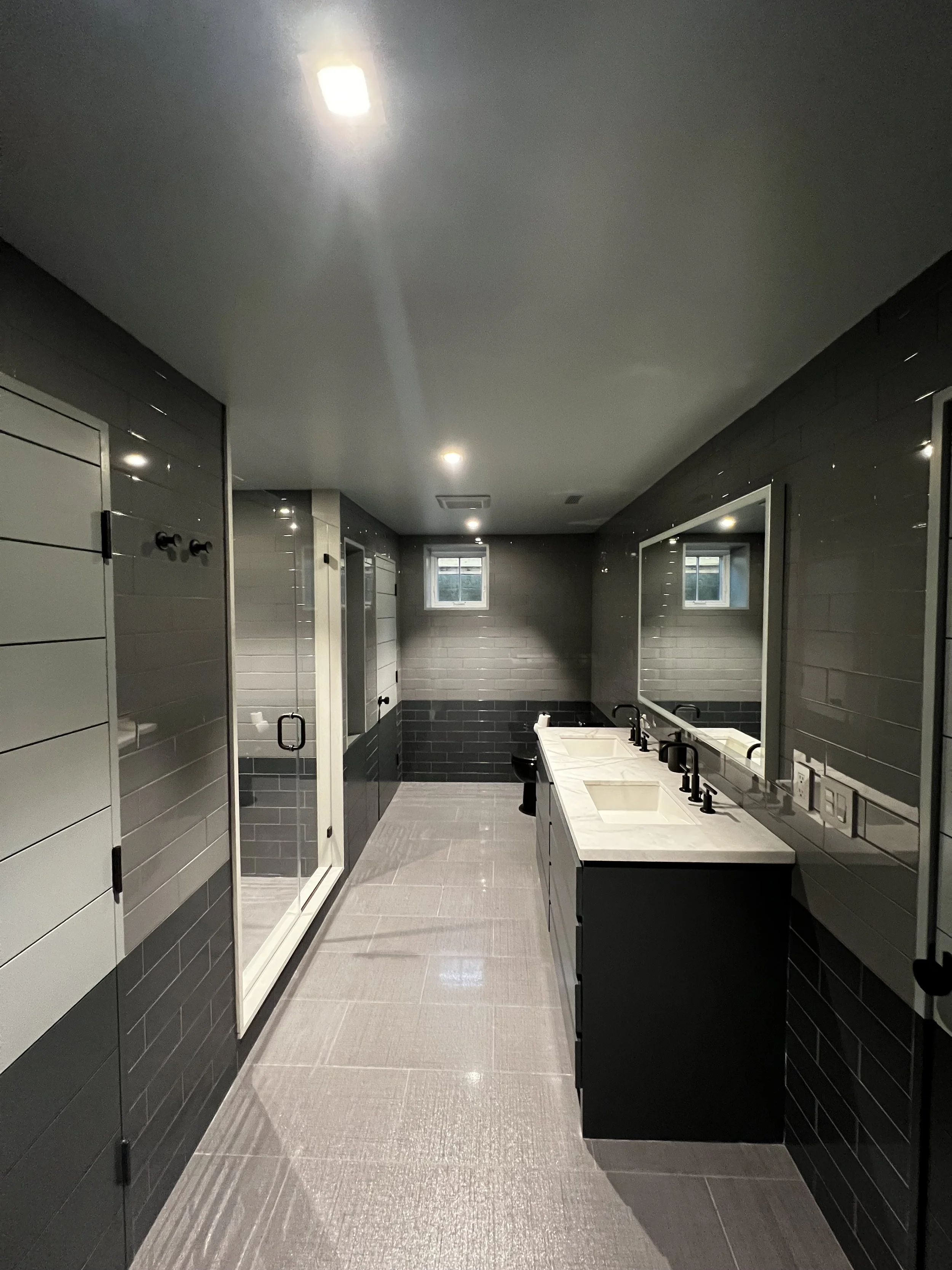 Luxury bathroom tile installation featuring premium materials, custom designs, and flawless craftsmanship. We specialize in high-end shower walls, floors, and elegant bathroom finishes.