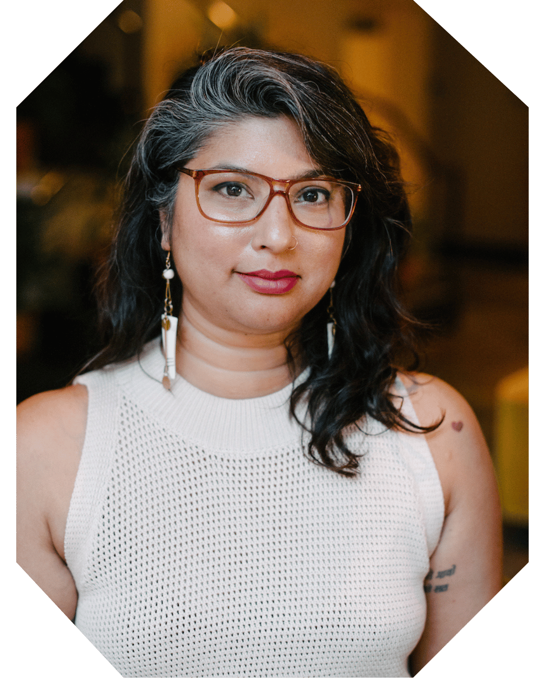 Professional headshot of book coaching client Sheila Akbar.
