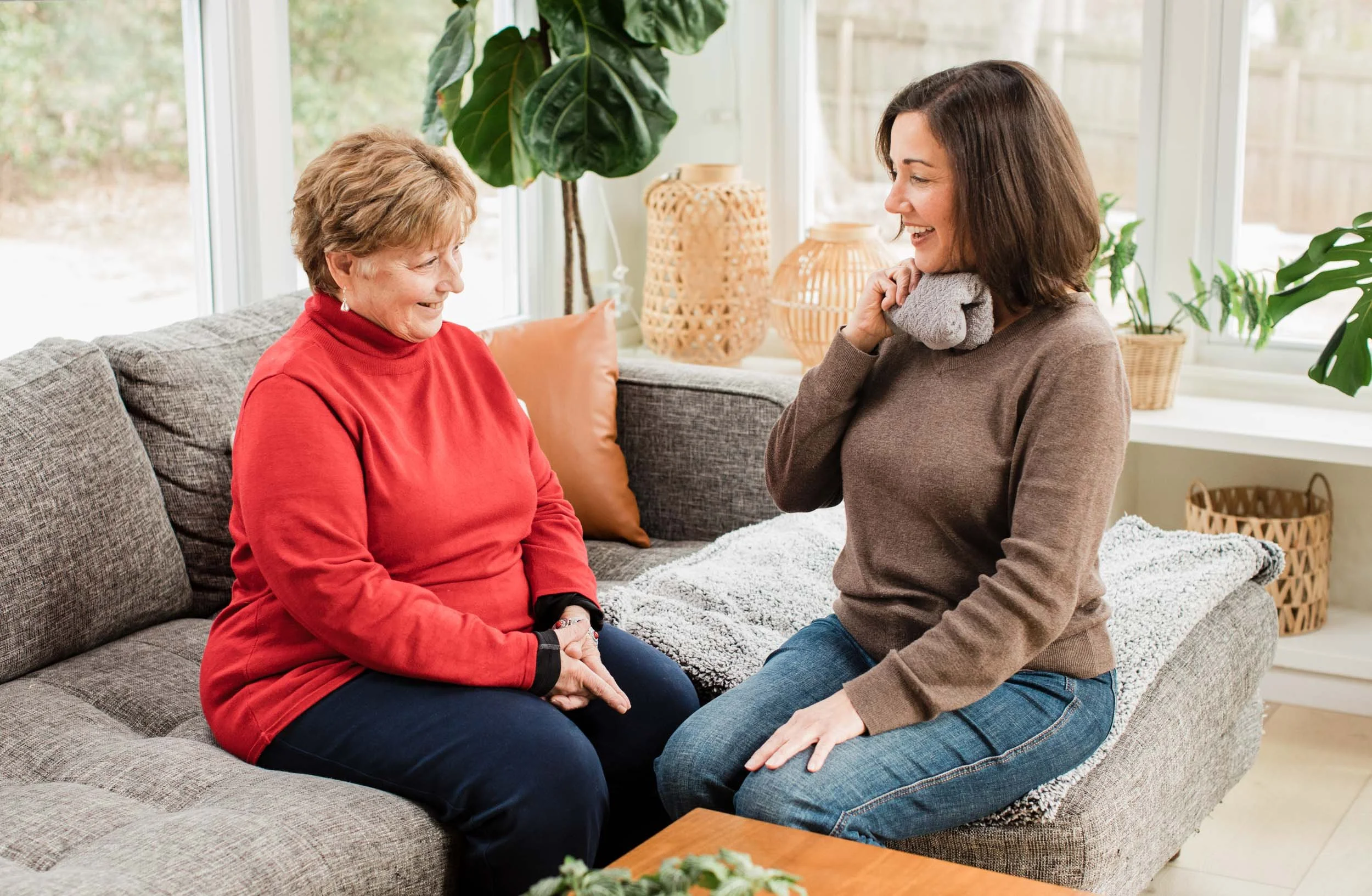 Speech therapist conducting swallowing exercises with a senior client in Greenville, SC.