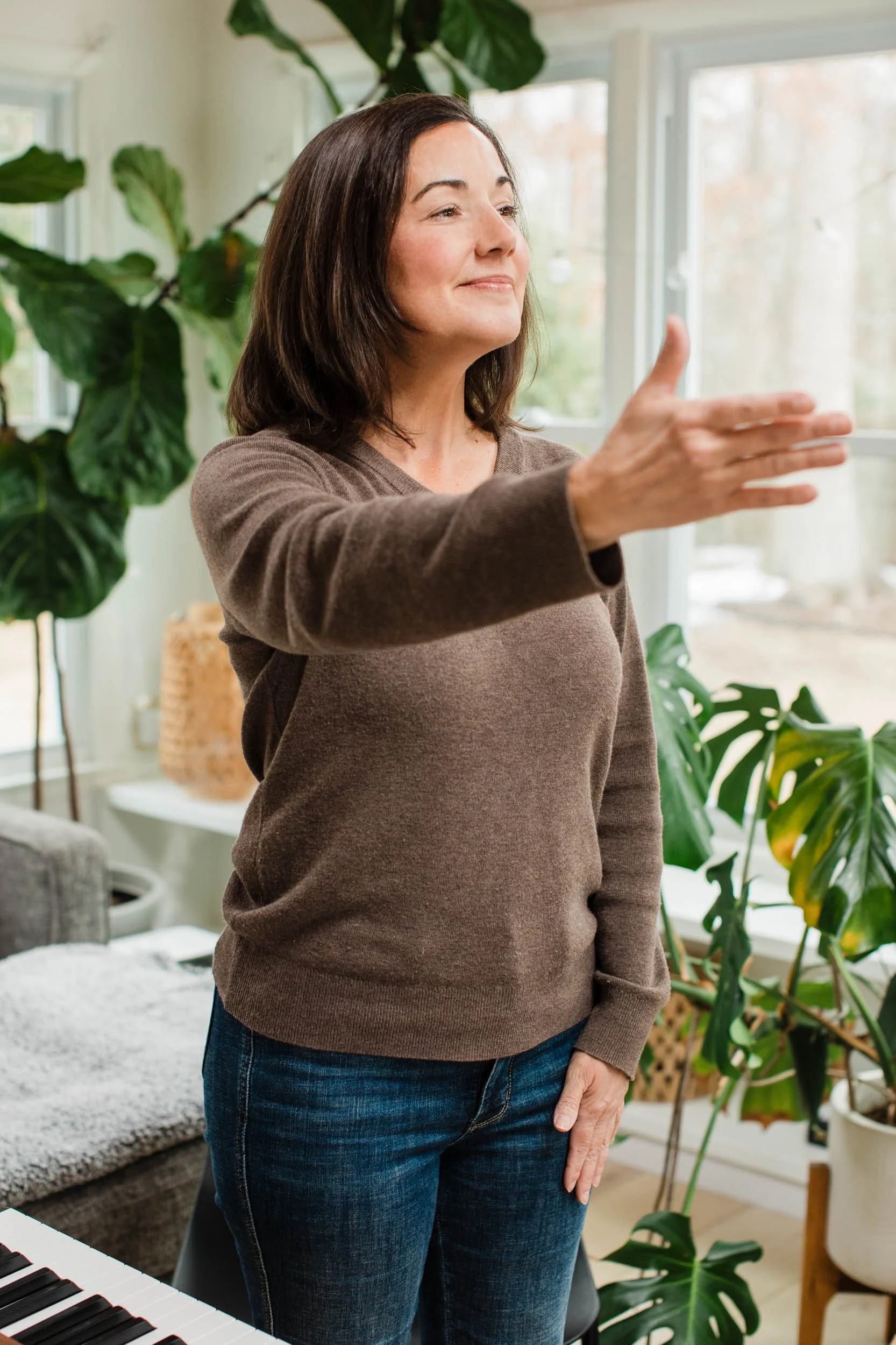Kristin Calhoun teaching a singing lesson to a student in her Greenville vocal studio.
