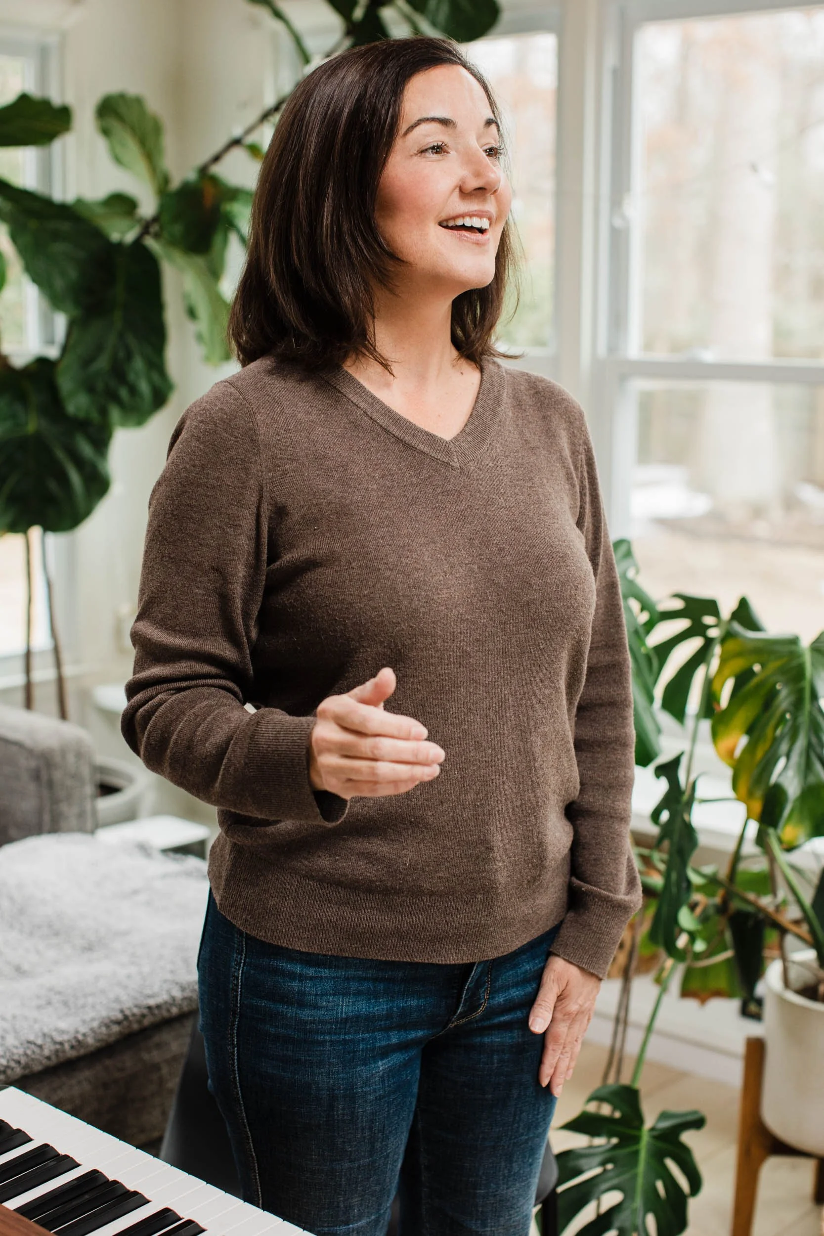 Kristen Calhoun guiding a student through vocal exercises during a singing lesson in Greenville, SC.