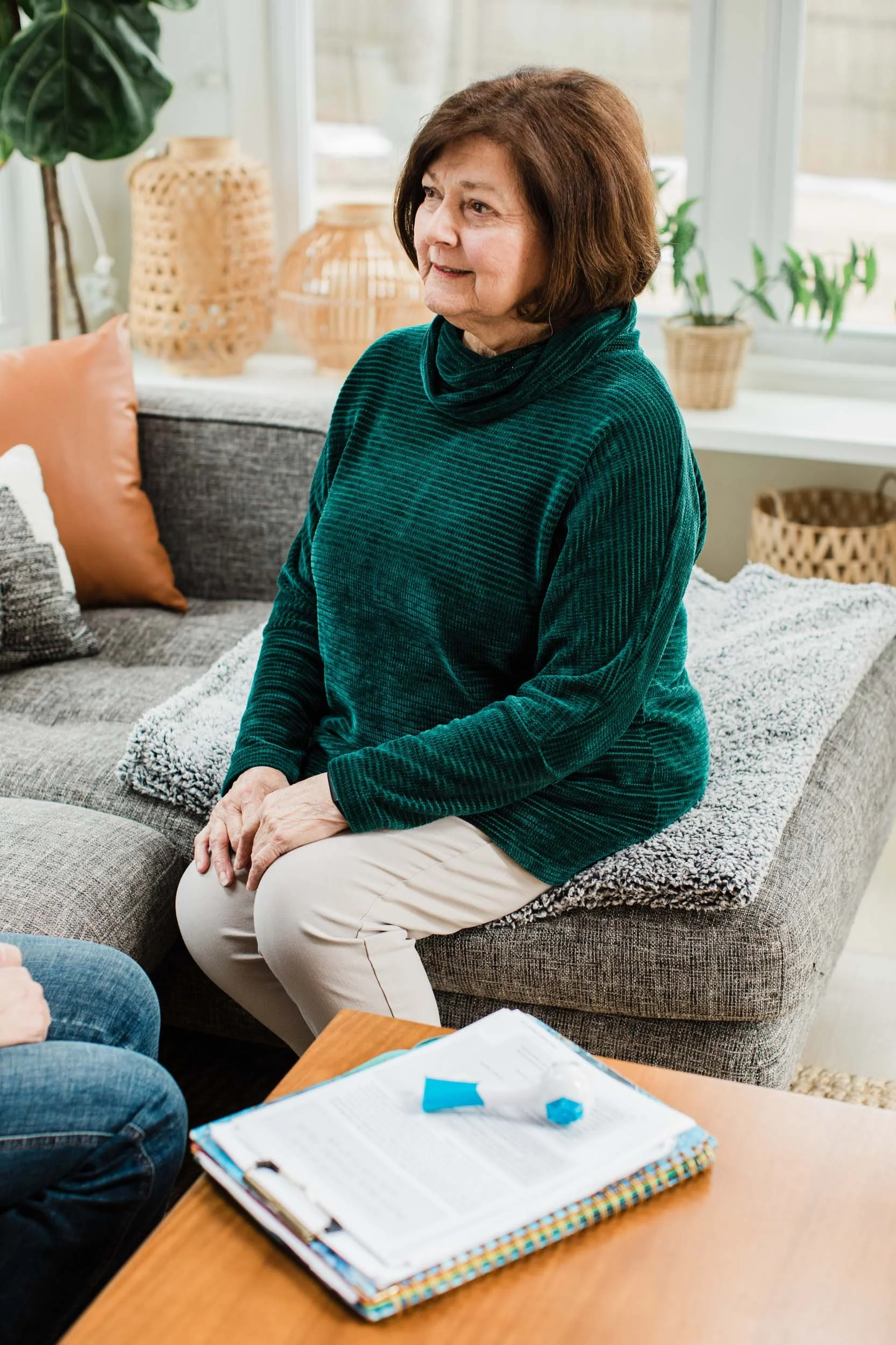 Pediatric patient focusing on verbal guidance with a speech-language pathologist.