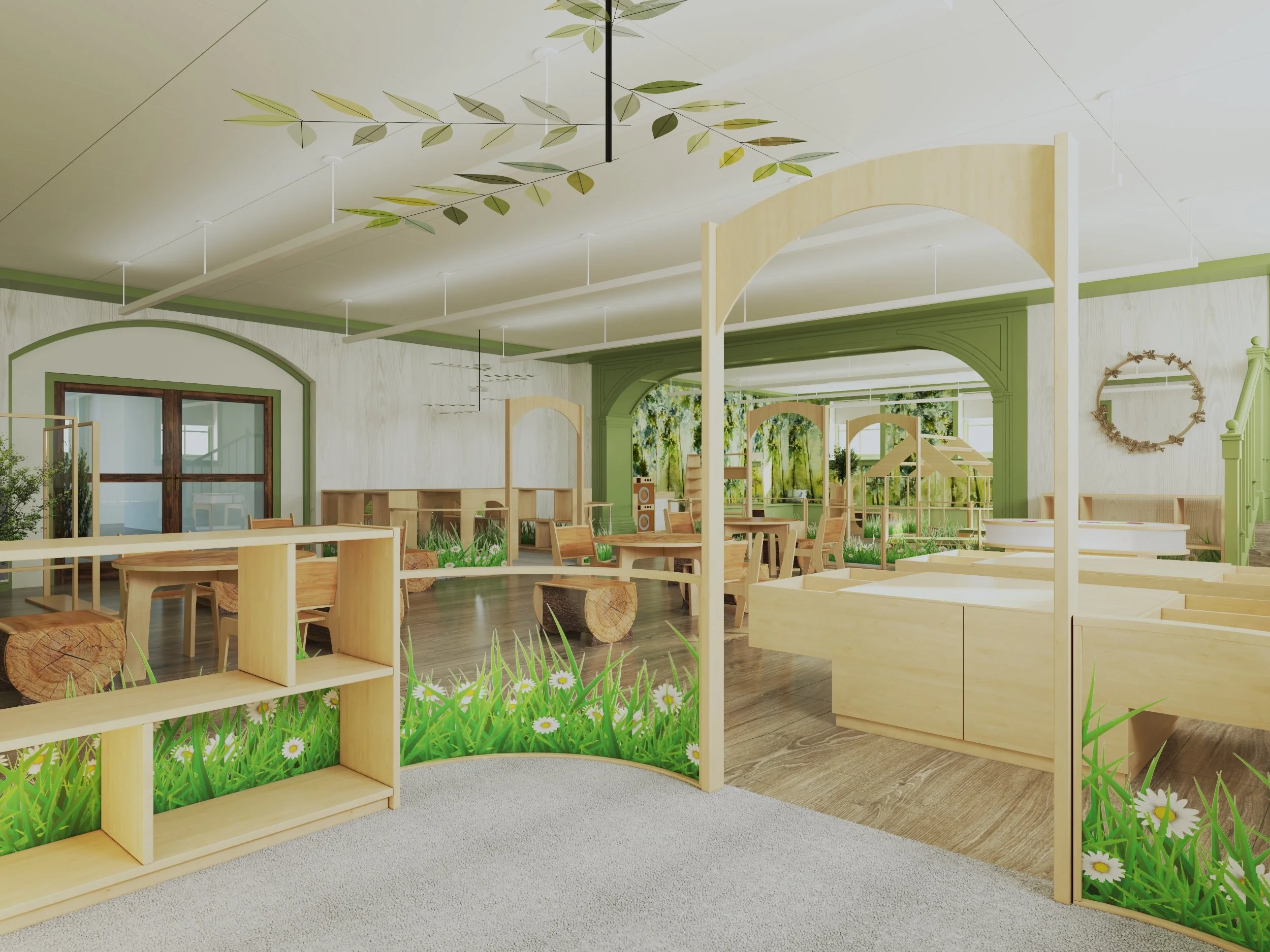 A bright, nature-themed indoor space with wooden furniture, green accents, and decorative elements resembling grass and trees, suggesting a child-friendly or educational environment.