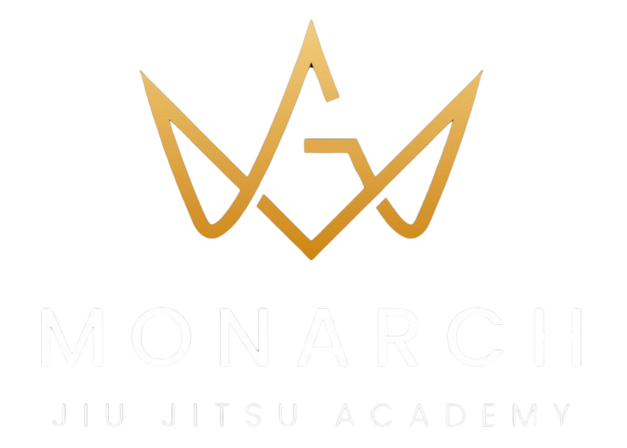Logo featuring a stylized golden crown above the word 'MONARCH' in bold, white letters, with 'Jiu Jitsu Academy' written underneath.