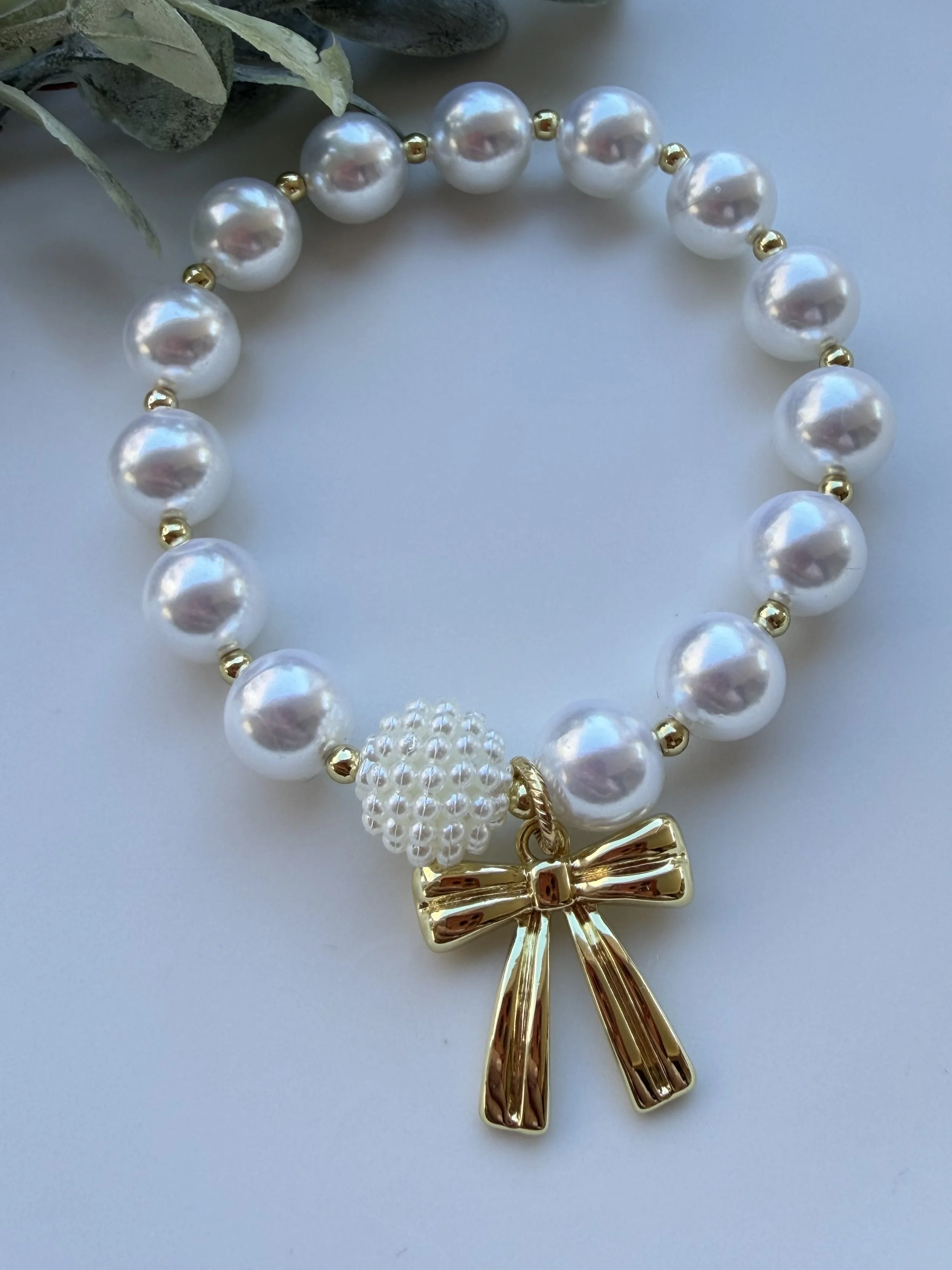 Pearl Bracelet with Gold Bow Charm