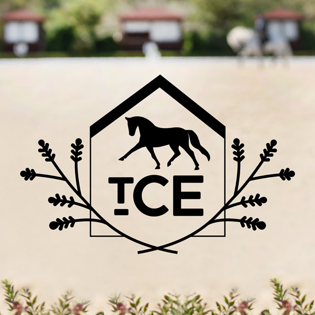 A logo featuring a horse inside a house-shaped outline with the letters '{TCE}' below, surrounded by decorative branches on either side.