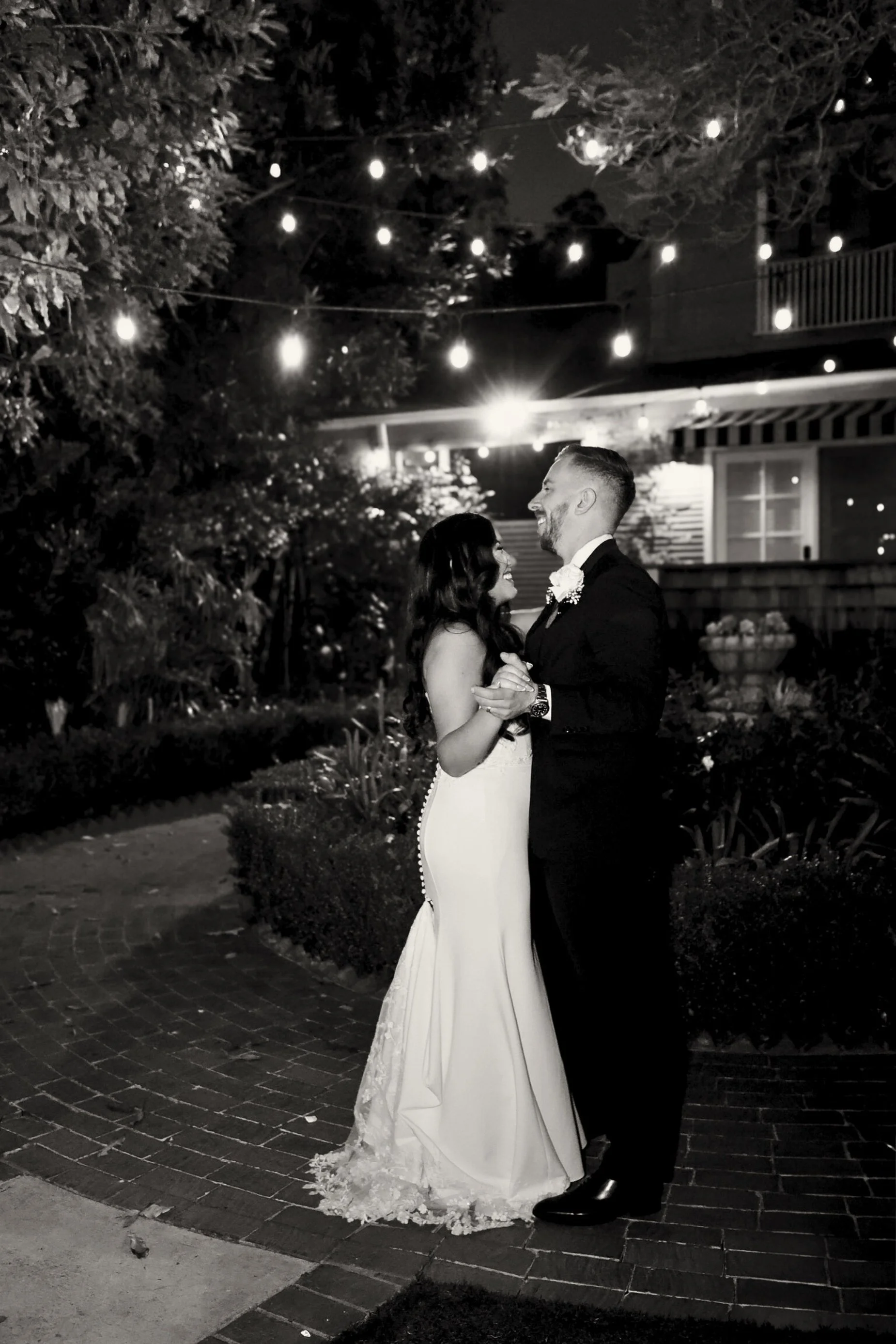 bride groom private dance under the string lights.jpg