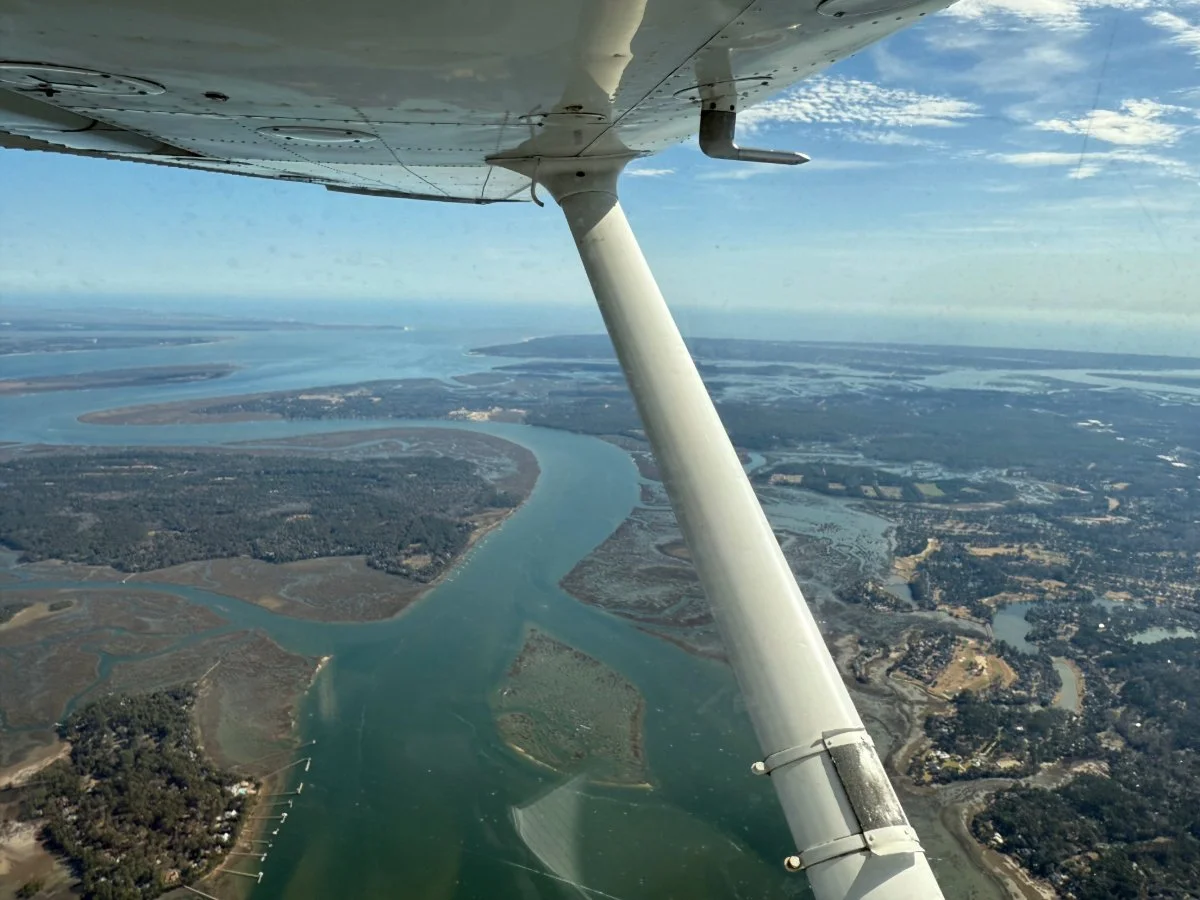 View from Cessna flying over water