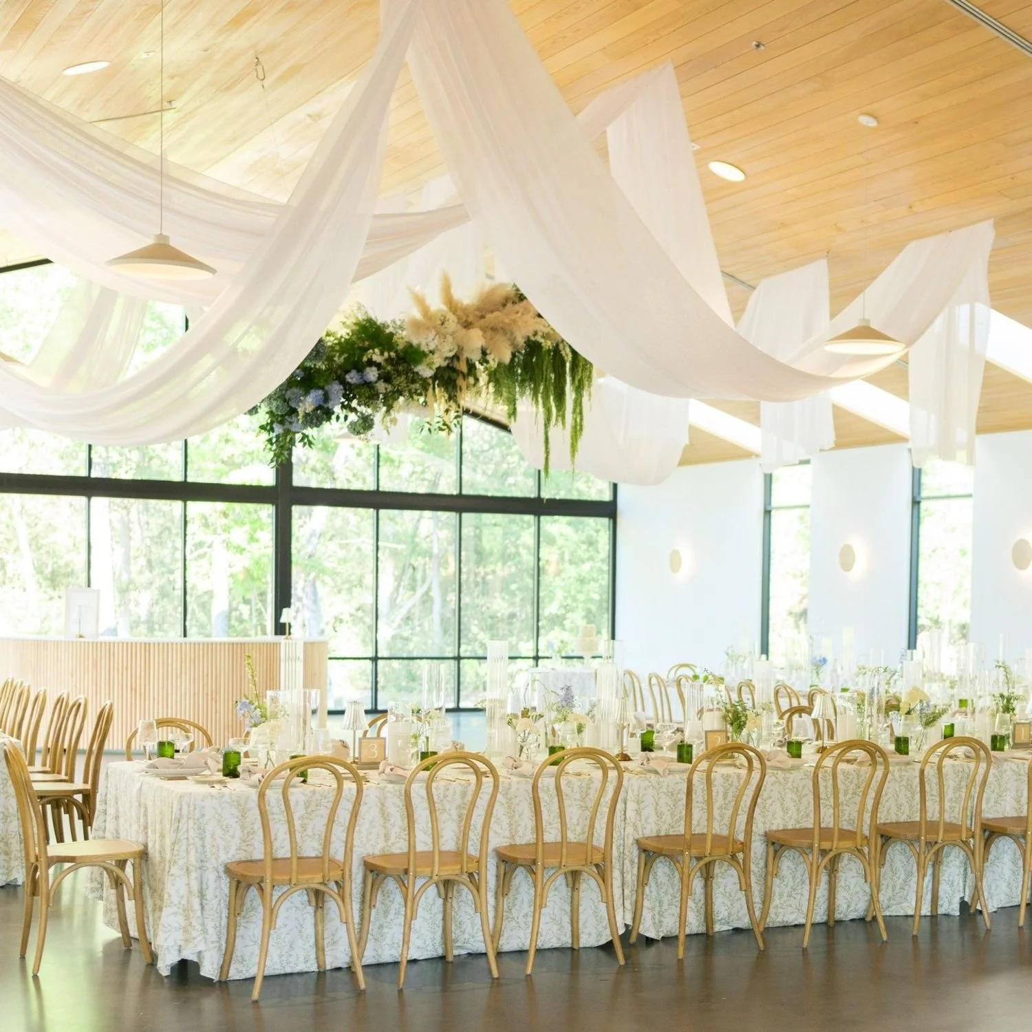 A beautiful dining hall setup for a wedding catered by Gourmet Gals Austin.