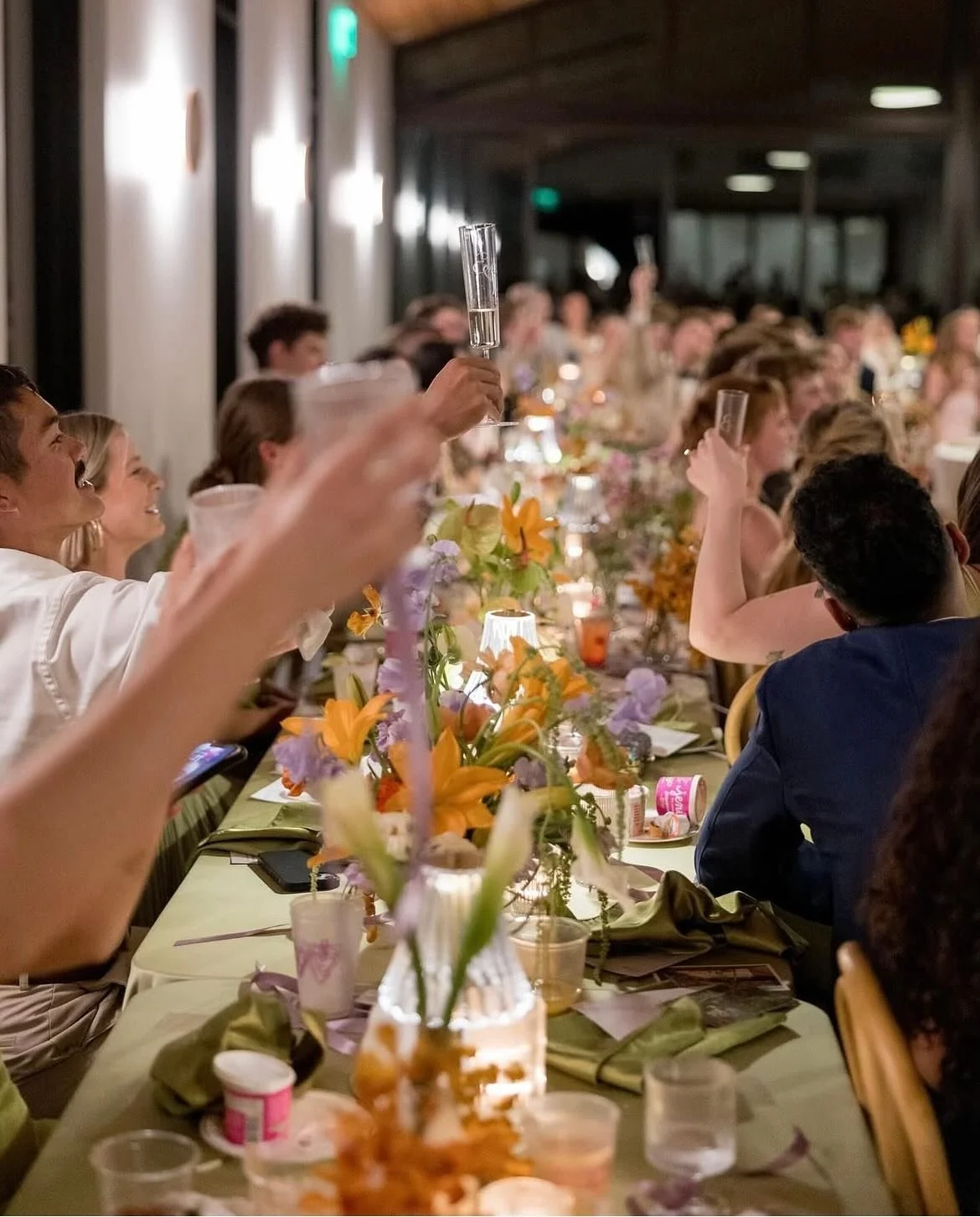 People celebrating at an event catered by Gourmet Gals in Austin, Texas