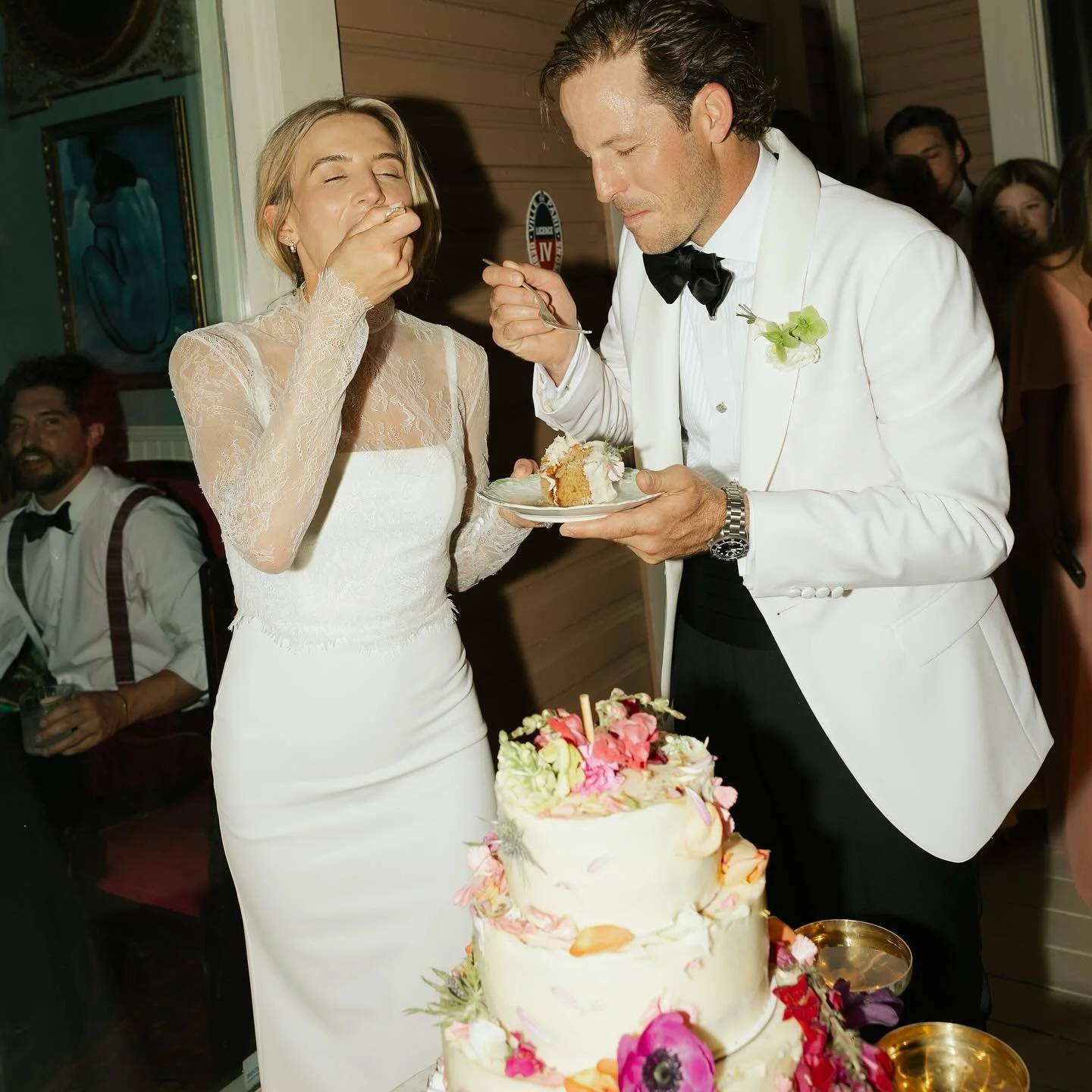 Couple enjoying cake at their wedding catered by Gourmet Gals in Austin. Texas.