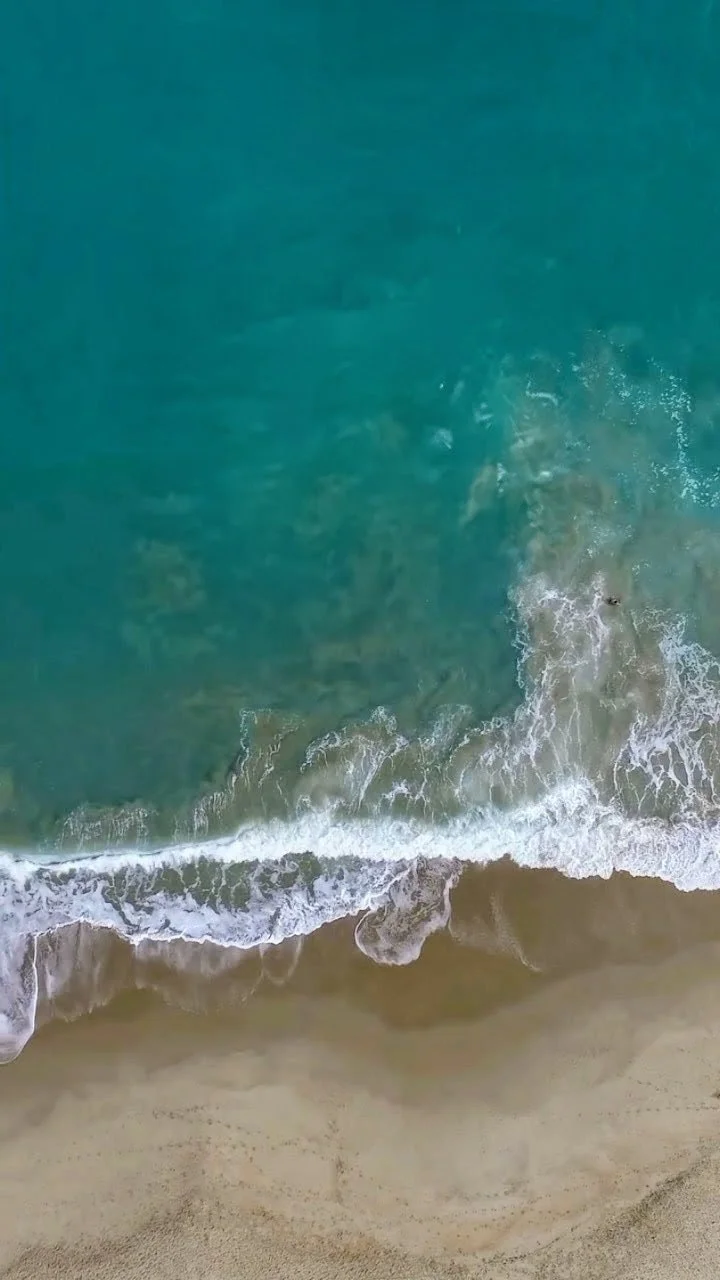 A picture of waves washing up a shoreline