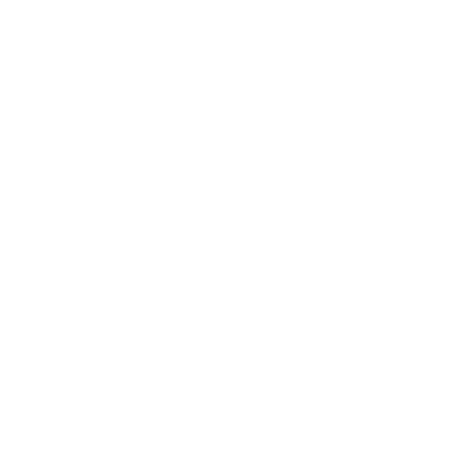 A hand watering a small plant with two leaves.