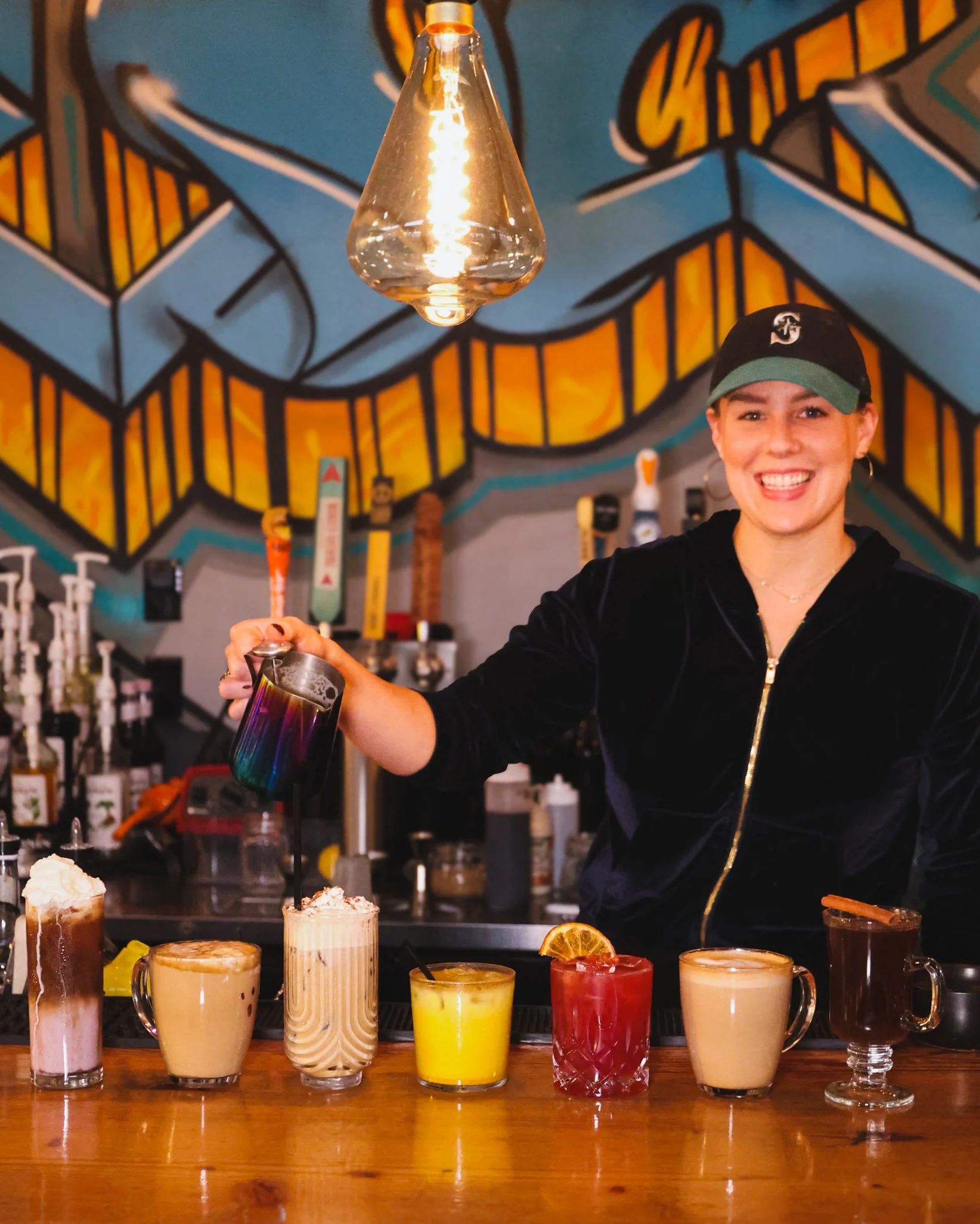 Bartender behind the bar at Locus of Bellingham downtown coffee wine and beer bar