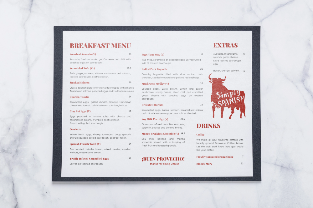 Breakfast menu with sections for breakfast items, extras, drinks, and a logo with a red bison and the text 'Simply Spanish' on a white background.
