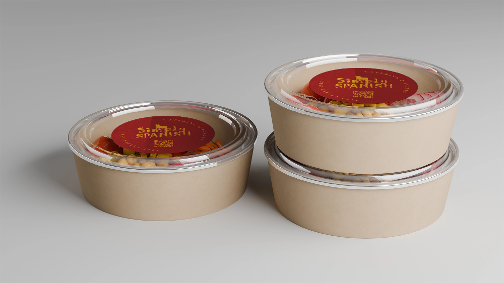 Three beige food containers with clear lids, showing a pizza salad inside, placed on a light gray surface.