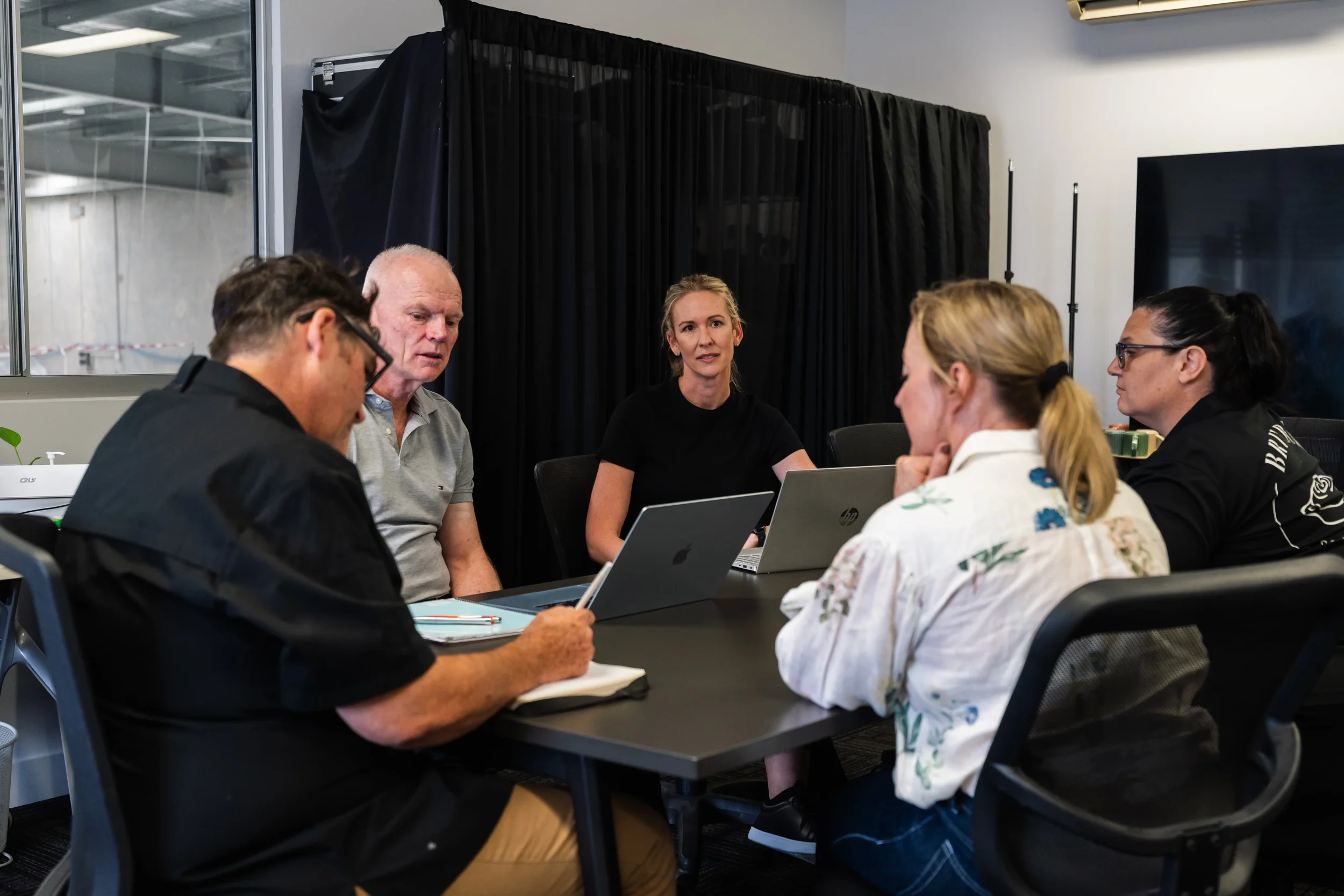 HR team implementing practical people strategies for business success.