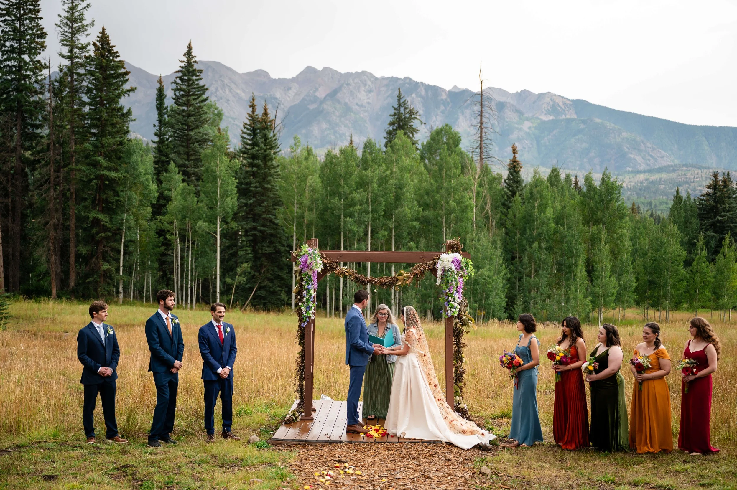 A Rainy-Day Mountain Wedding With Bold, Bright Bridesmaid Dresses at The Benchmark