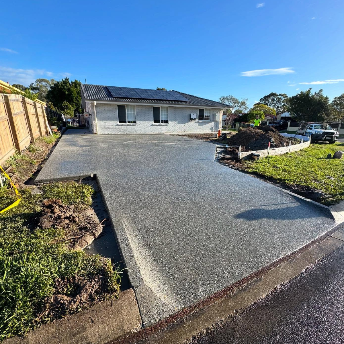 New Exposed Aggregate Concrete Driveway Installed By Bulty’s Concreting On The Sunshine Coast, Showcasing High-Quality Residential Driveway Concreting And A Durable, Modern Finish.
