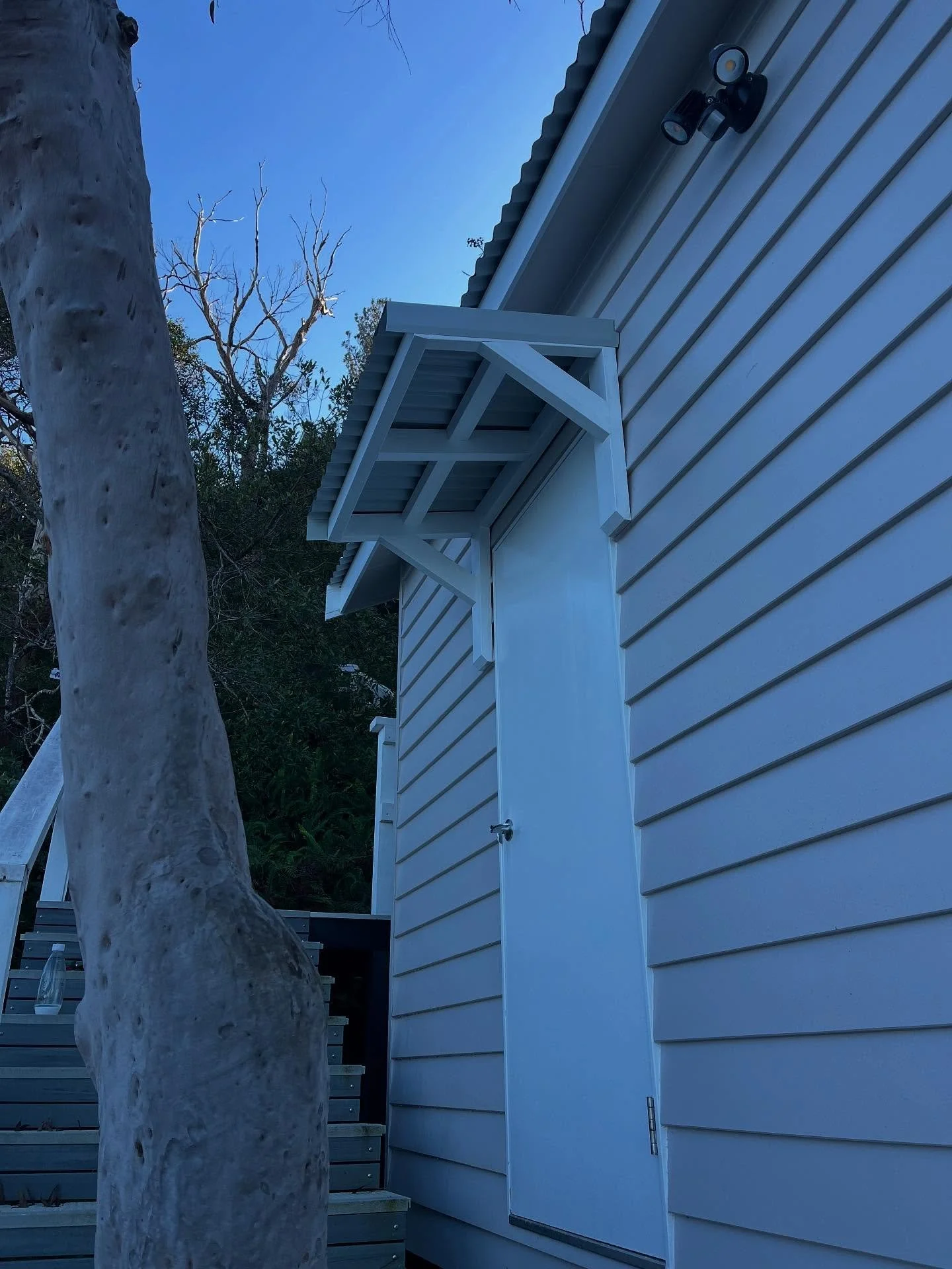 Small awning build to protect a front door from the weather