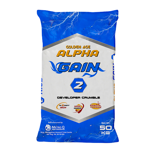 A blue and white bag of Alpha Gain 2 Developer Crumble, a supplement or product, with lightning bolt graphics at the top and logo and text details, indicating it weighs 50 kilograms.