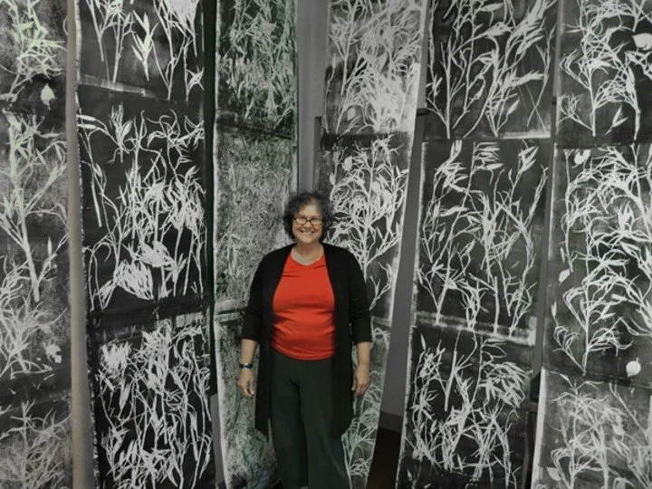 Artist Ann Kresge at pop up in downtown unleased bank space
