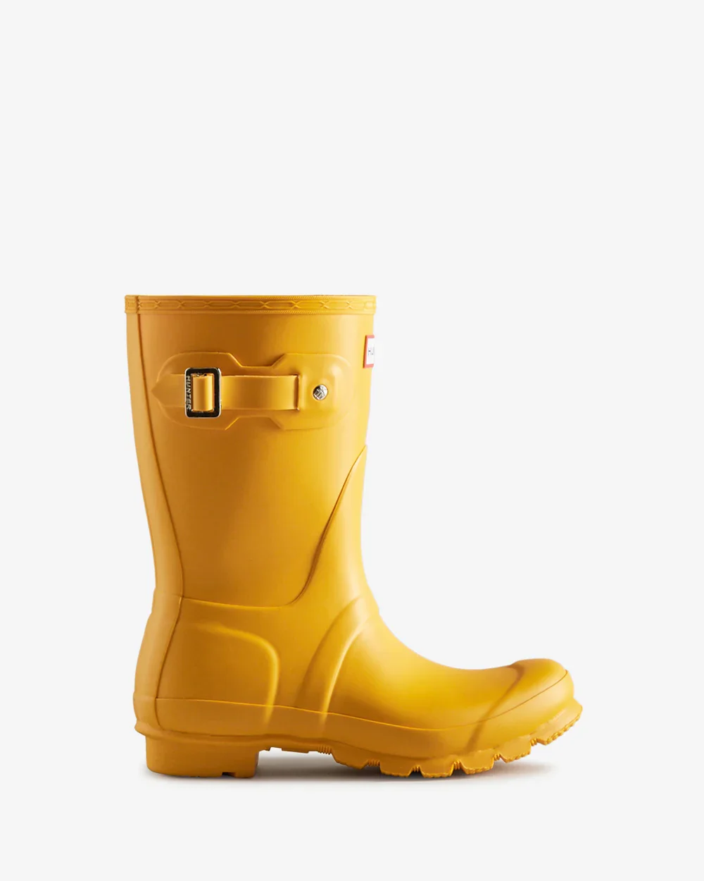 A yellow rubber rain boot against a white background.