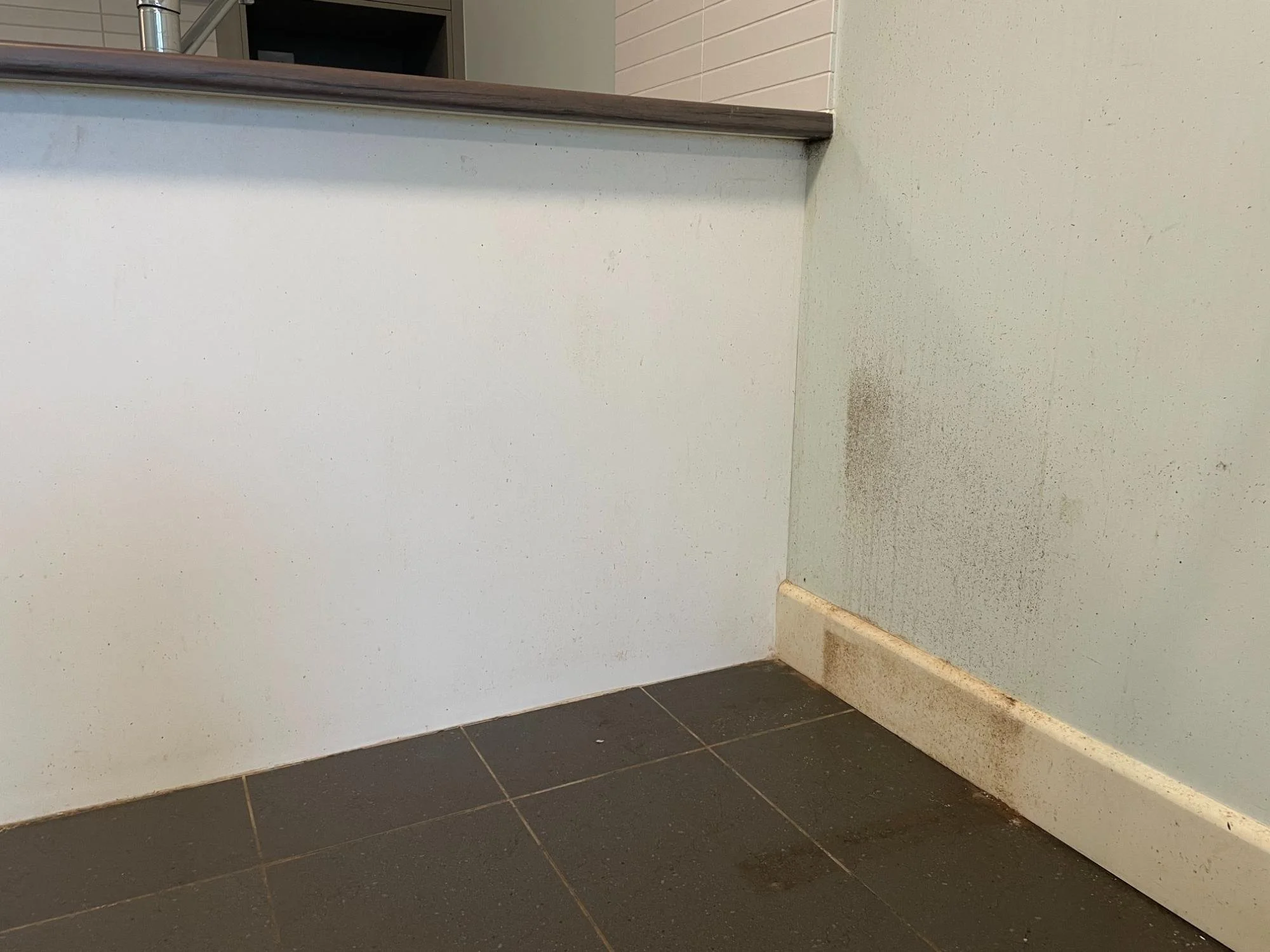 Kitchen wall and tiled floor before deep cleaning by Kat Clean Sydney, NSW