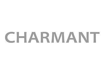 The word "CHARMANT" in bold black capital letters on a white background.
