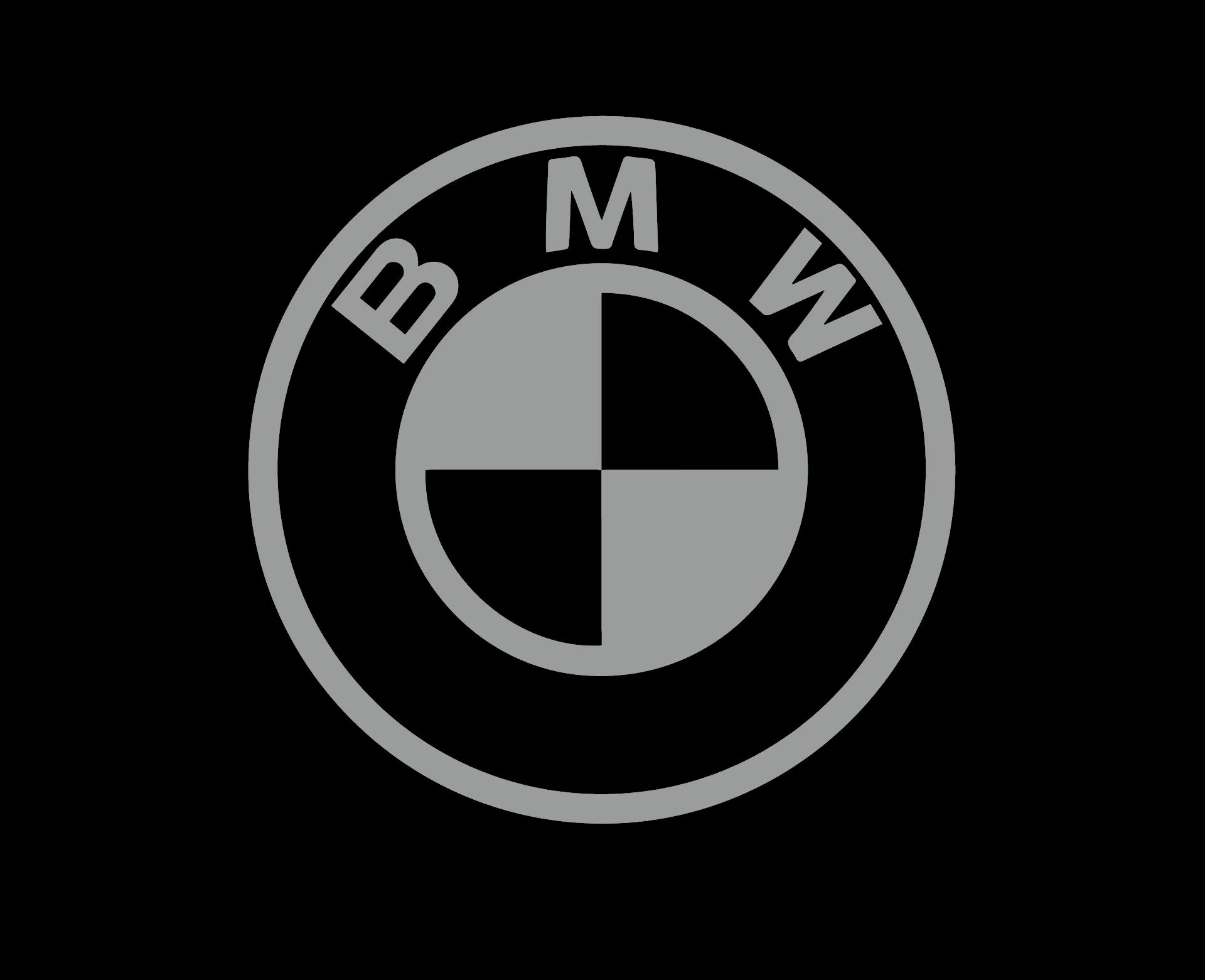 Gray BMW logo on a black background.