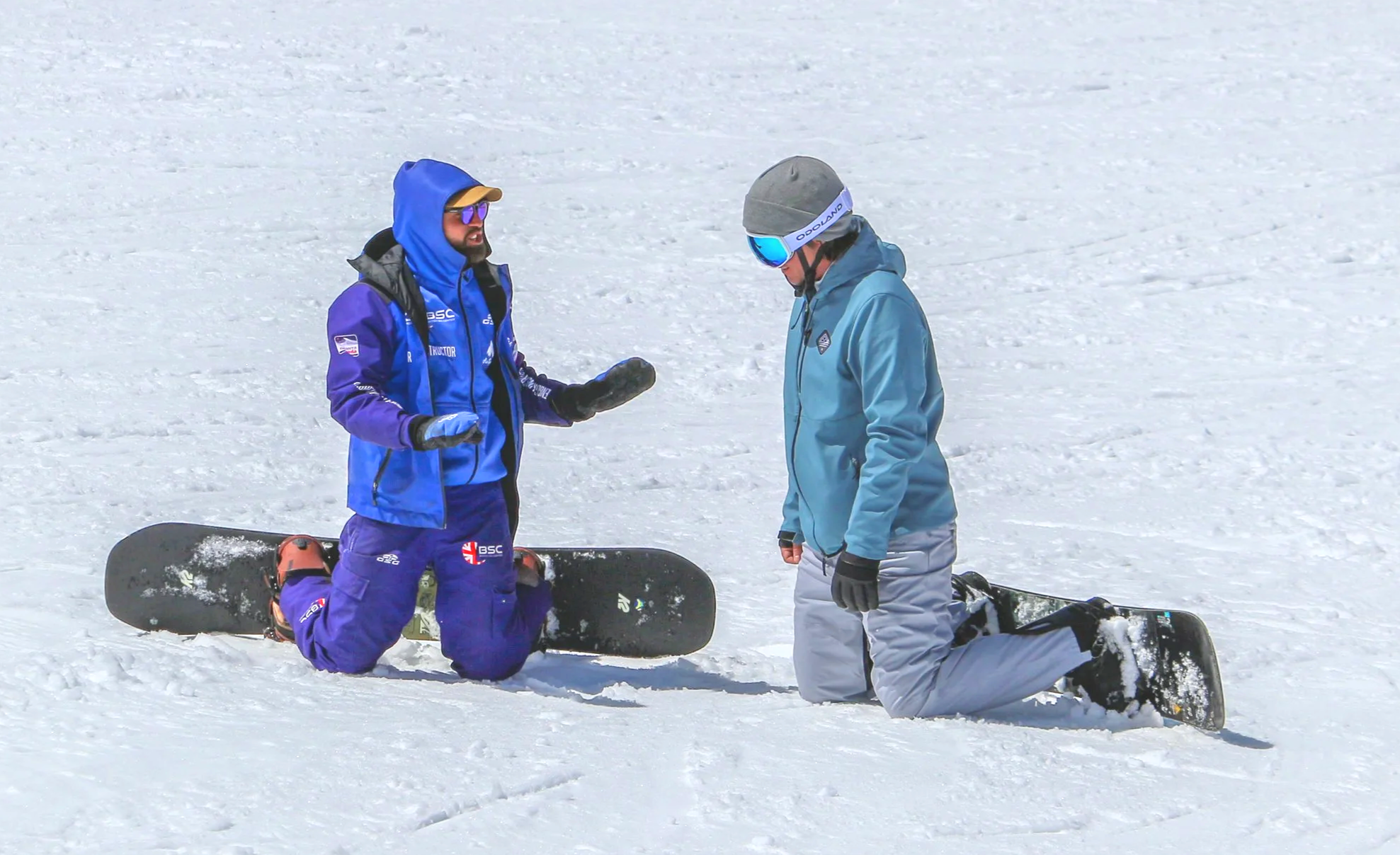 English snowboard instructor teaching on the slopes of Sierra Nevada
