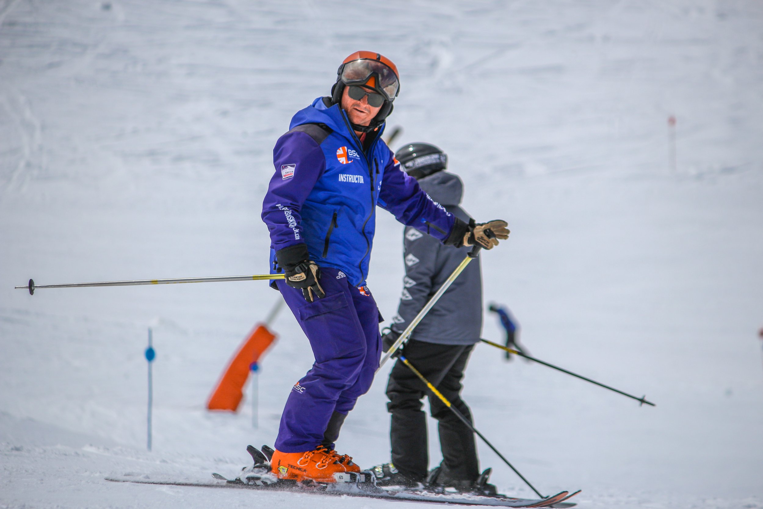 Ski Instructor in a British Ski Center Uniform teaching in english in Sierra Nevada