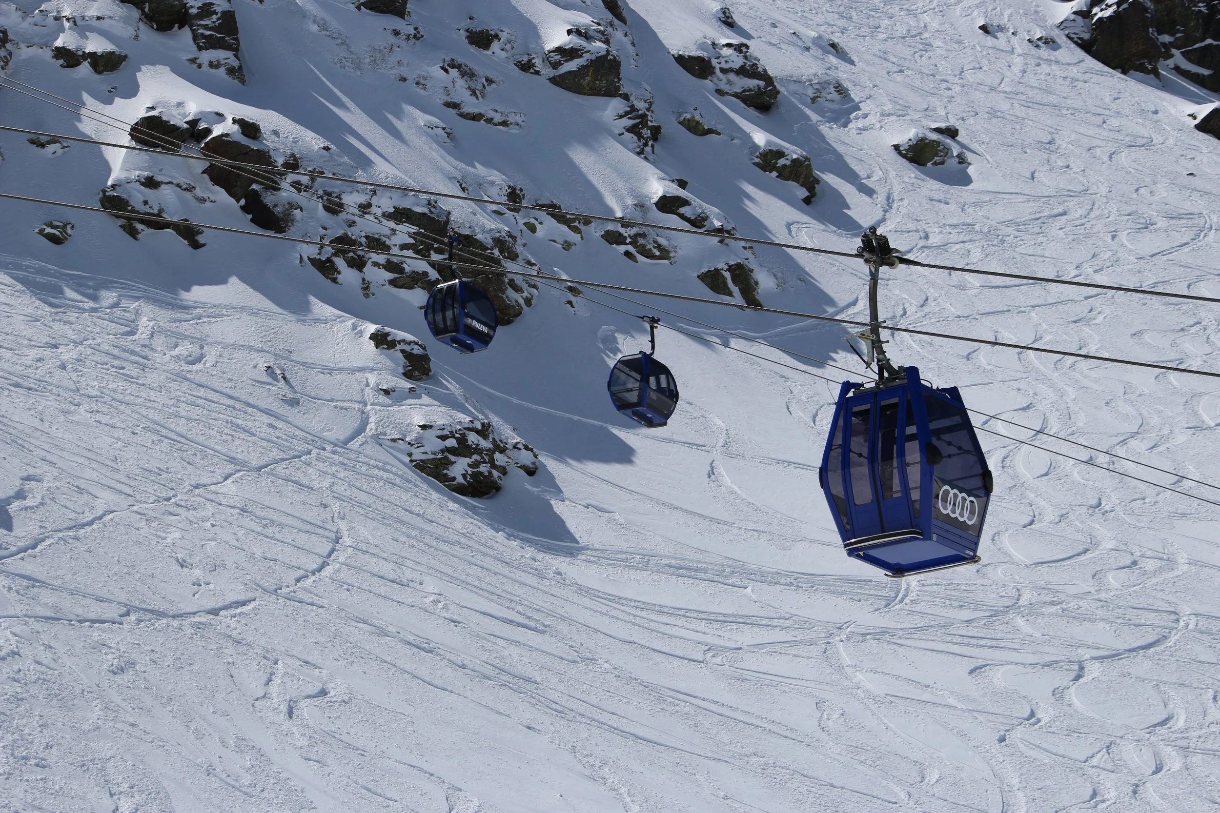 Blue gondola ski lift in Sierra Nevada Spain