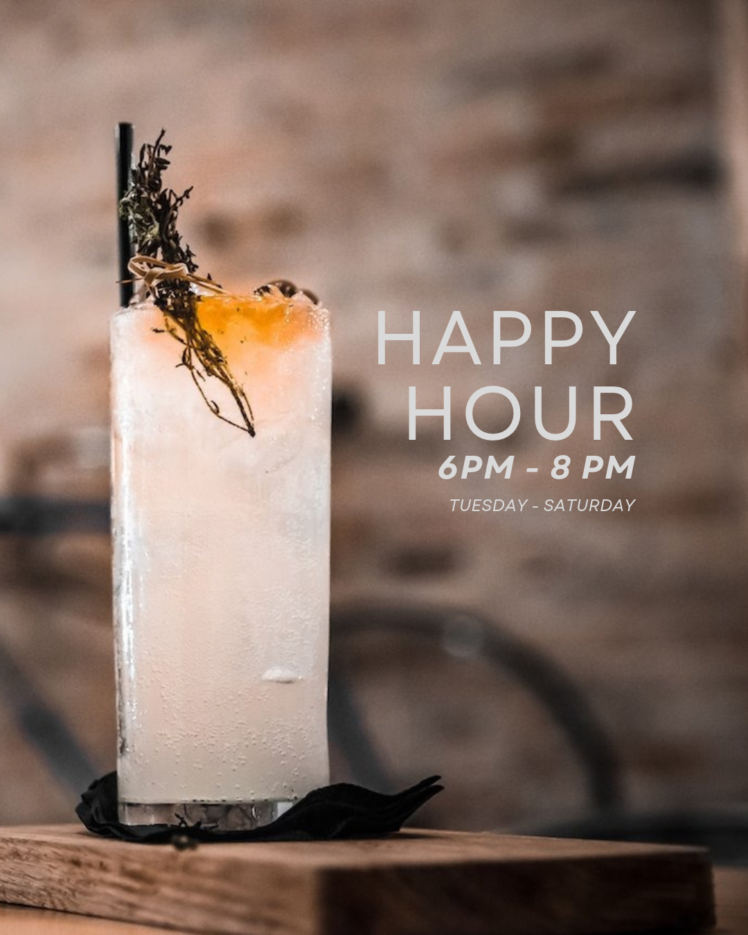 White colour gin based lemon cocktail with lemon slice, thyme and black straw. Happy Hour from Tuesday to Saturday from 6pm - 8pm
