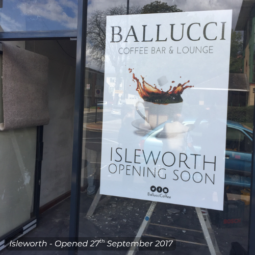 Sign for Ballucci Coffee Bar & Lounge announcing upcoming opening in Isleworth on September 27, 2017, with a coffee cup splash graphic.