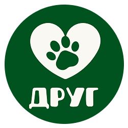 Green circular sign with a white heart containing a paw print inside and the word 'ДРУГ' (Friend) written below in white Cyrillic letters.