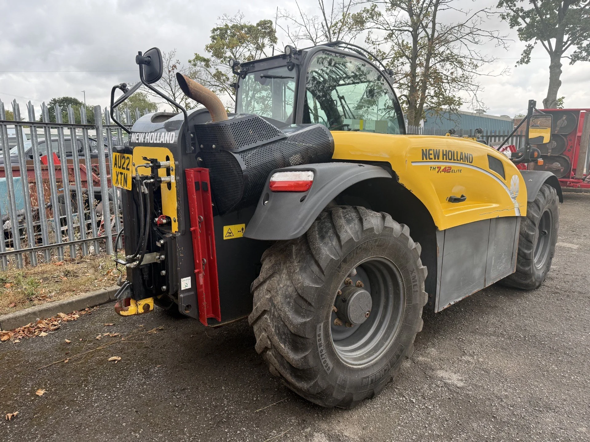 Yellow and black New Holland TH7.42 Elite Telehandler