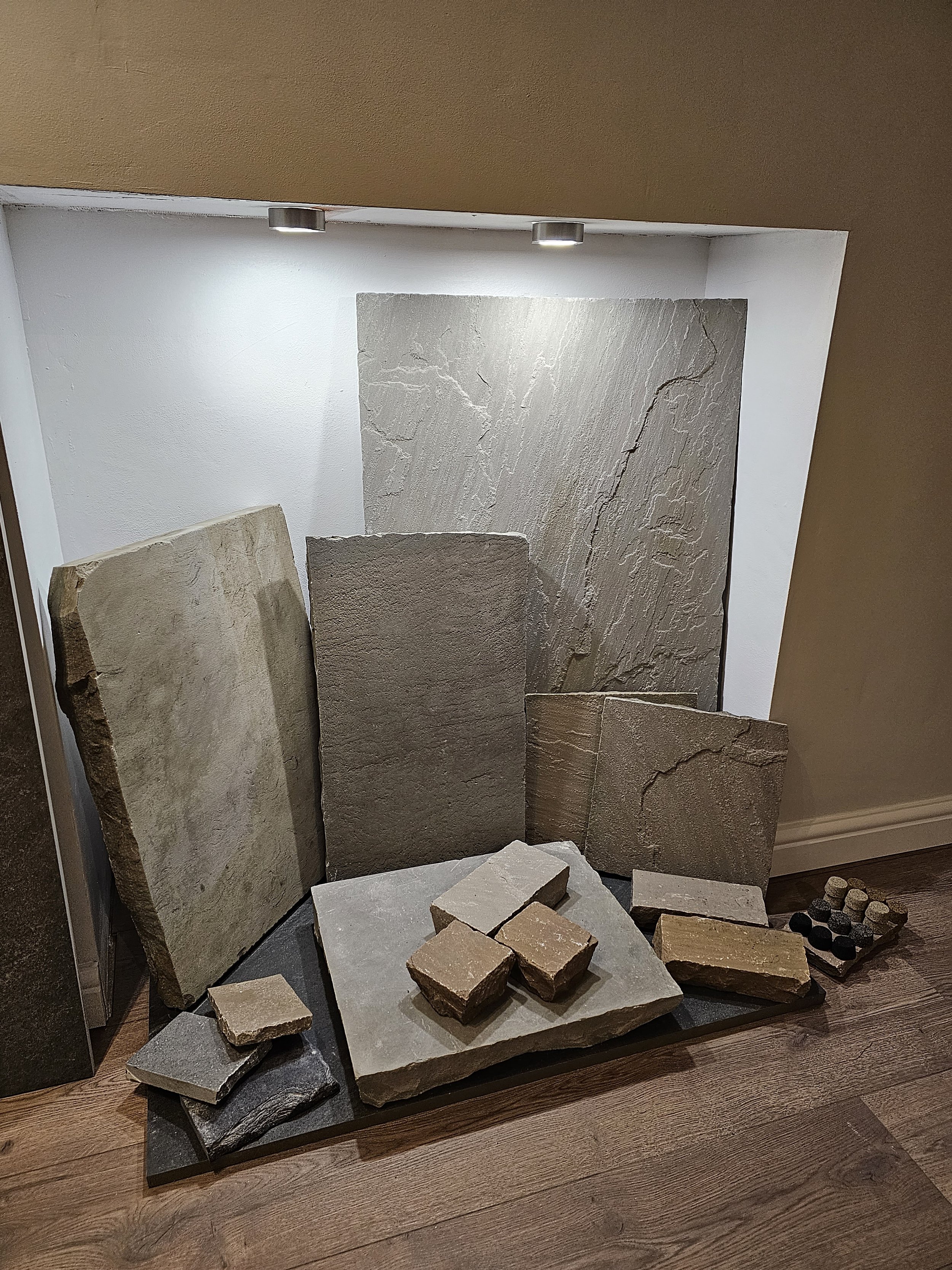 Display of various large natural stone slabs and York stone flags for driveways and patios