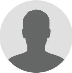 Ein silhouettenartiges Porträt einer Person vor einem hellen, runden Hintergrund.