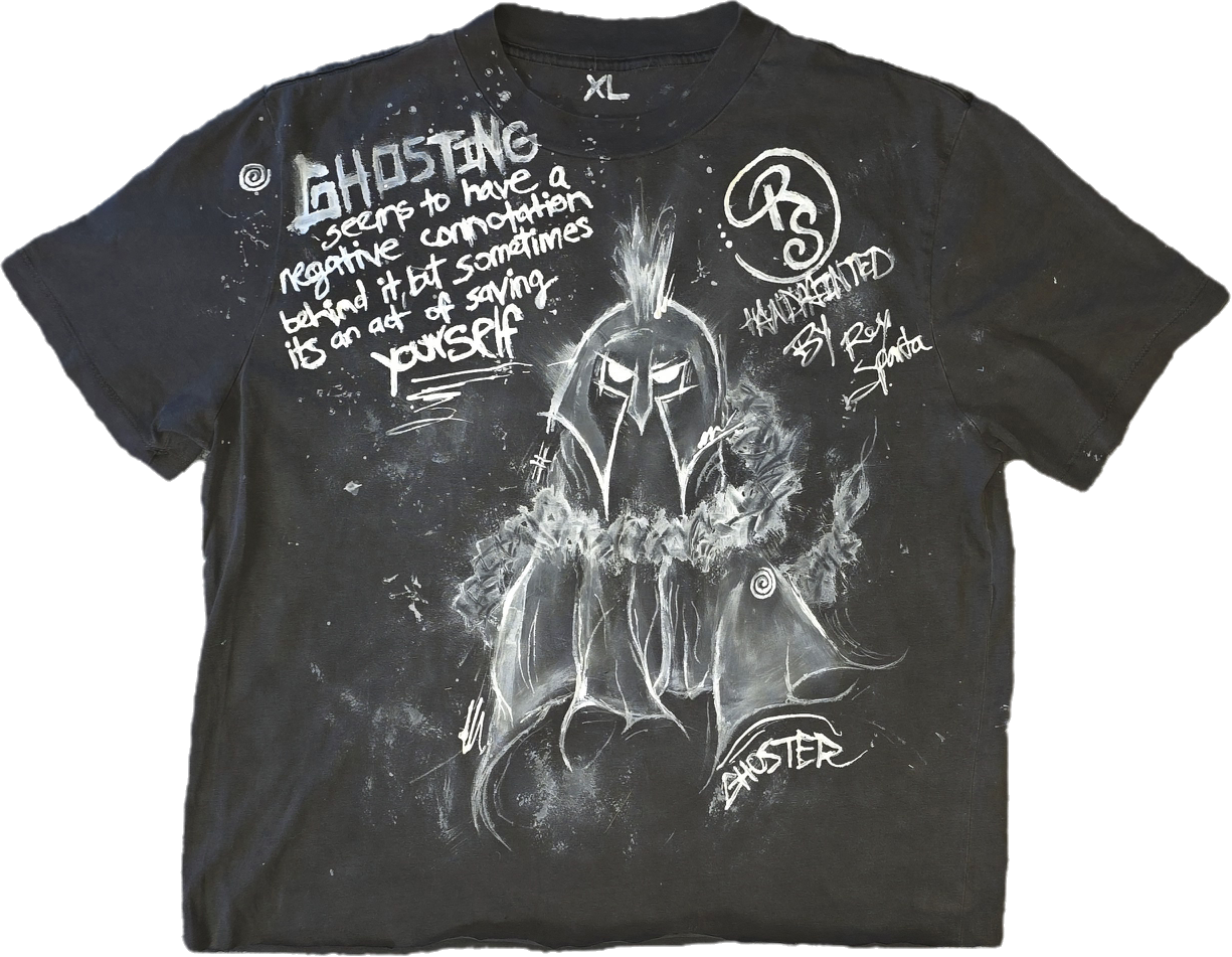 Black t-shirt with white graffiti-style illustration of a ghostly figure and text saying "Ghosting seems to have a negative connotation but sometimes it's an act of saving yourself." The shirt includes hand-painted design markings and the initials "RS."
