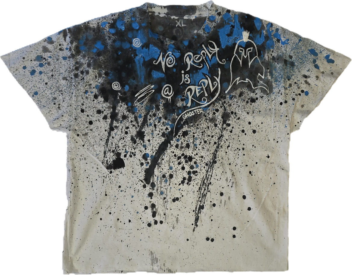T-shirt with abstract paint splatters and text "No Reply is Reply".