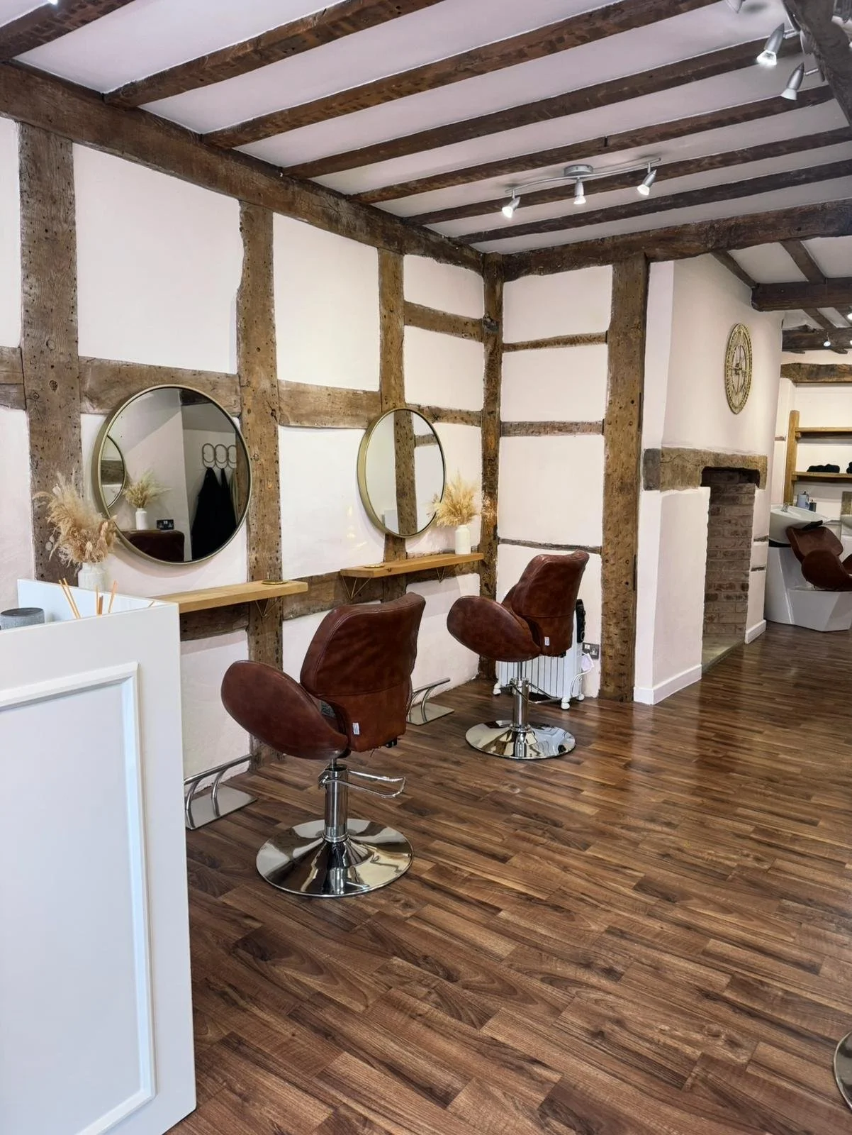 Salon chair view inside Blondee Studio’s calm, modern interior