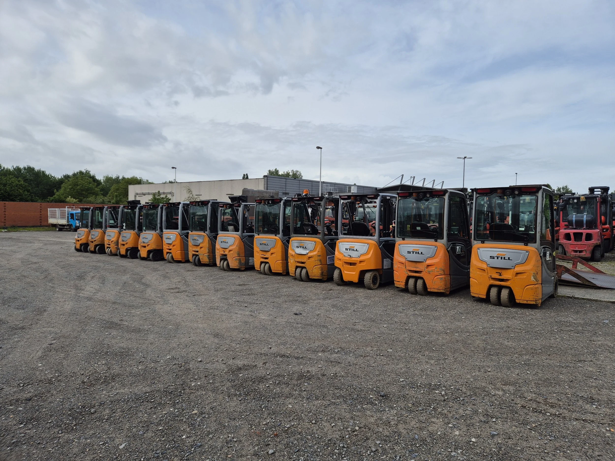 Row of used Still counterbalance forklifts for sale at VIMEX Comines, Belgium